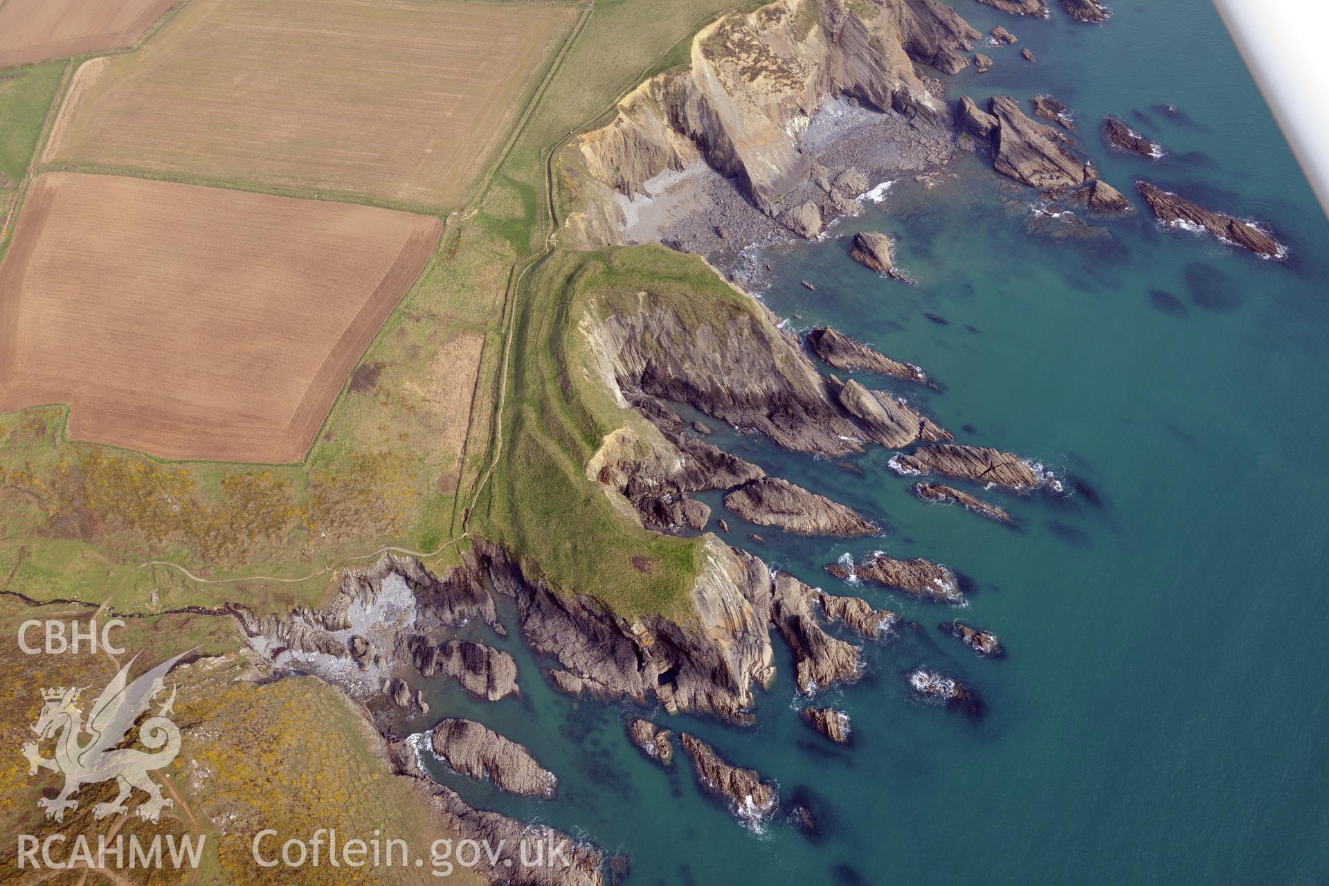 Aerial photography of Porth y Rhaw promontory fort taken on 27th March 2017 for structure from motion recording. Baseline aerial reconnaissance survey for the CHERISH Project. ? Crown: CHERISH PROJECT 2019. Produced with EU funds through the Ireland Wales Co-operation Programme 2014-2020. All material made freely available through the Open Government Licence.