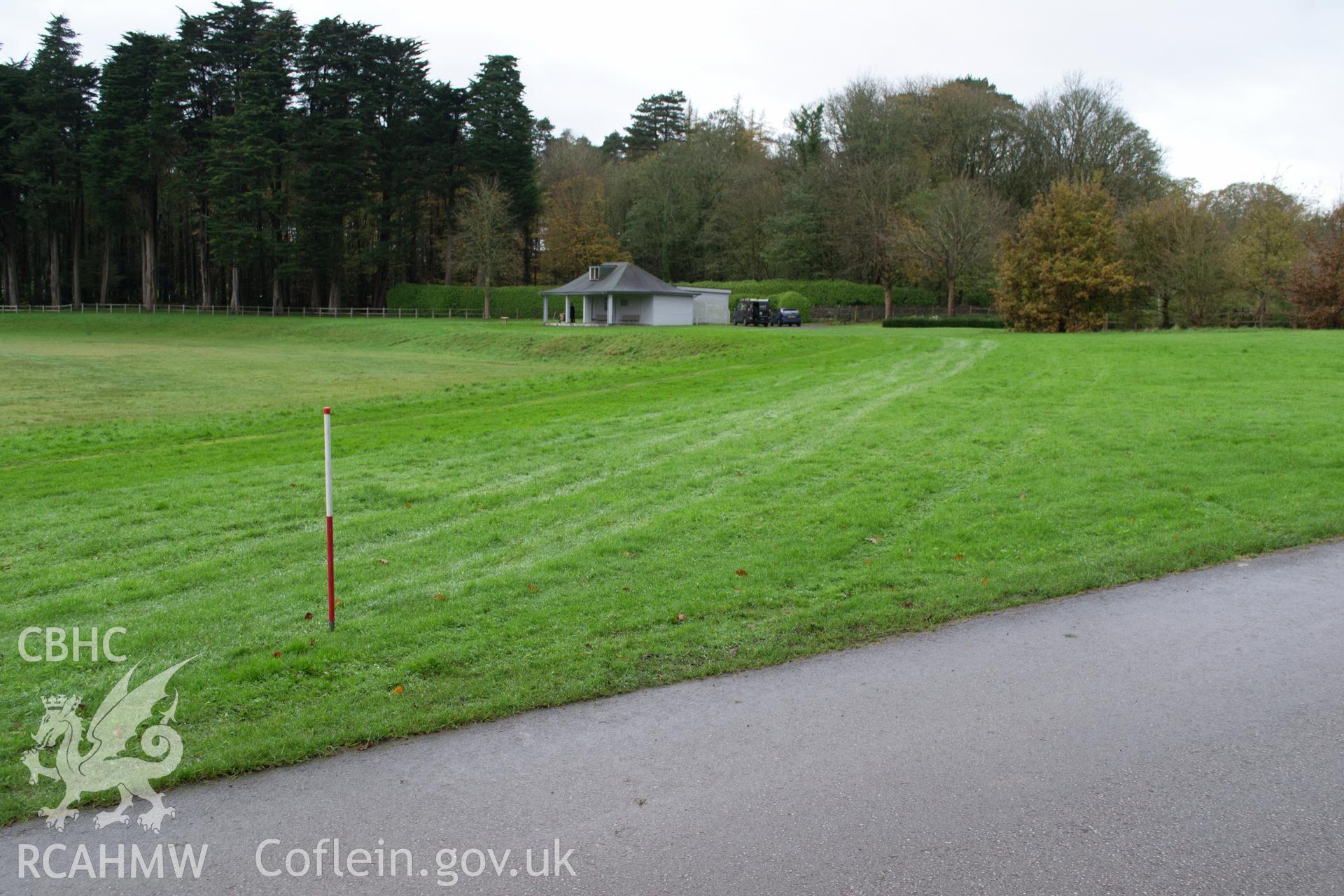 General view looking north west from carriage drive along cable route towards the pavilion. Photographed during archaeological watching brief of Plas Newydd, Ynys Mon, conducted by Gwynedd Archaeological Trust on 14th November 2017. Project no. 2542.