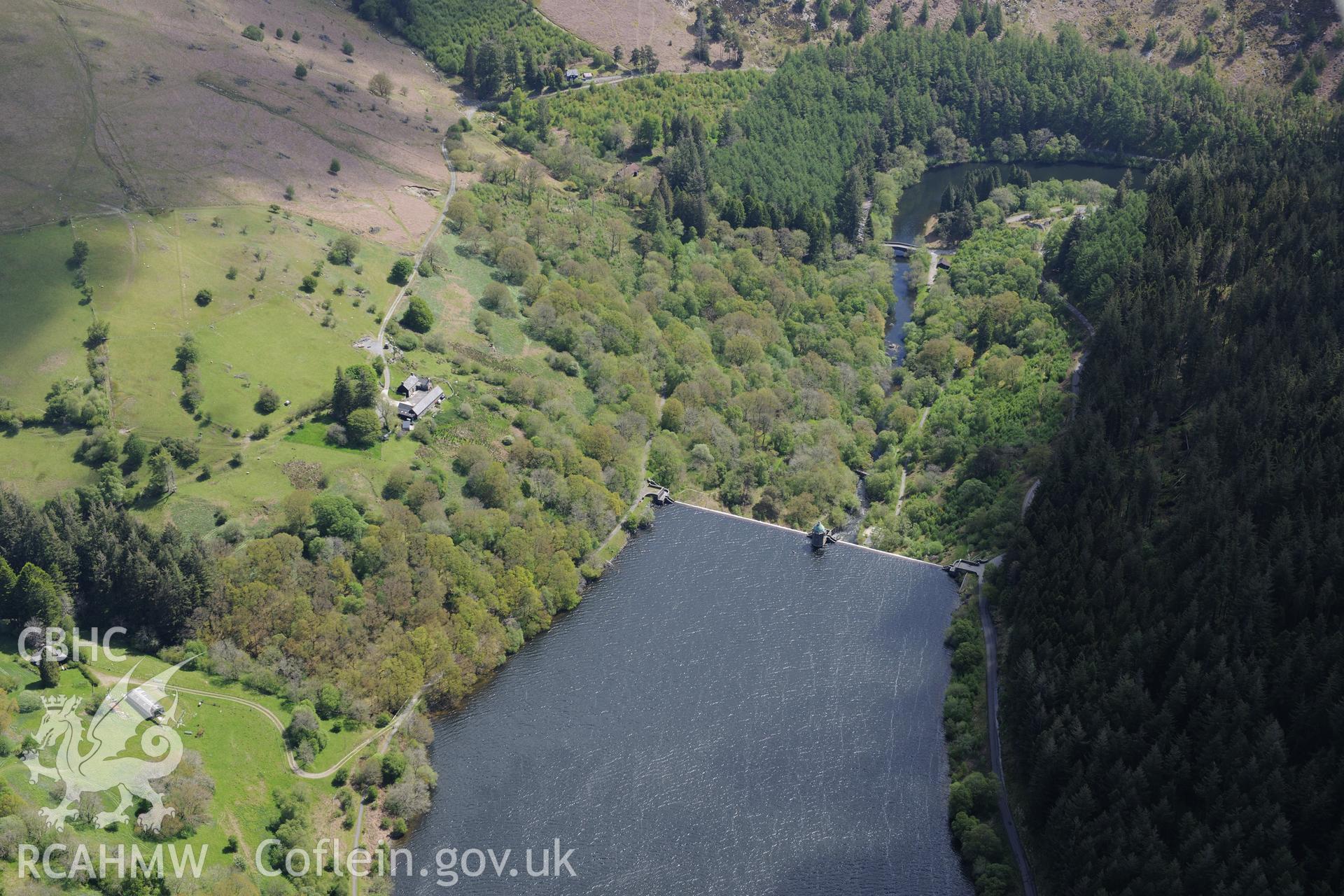 Pen-y-Garreg reservoir, dam and valve tower. Oblique aerial photograph taken during the Royal Commission's programme of archaeological aerial reconnaissance by Toby Driver on 3rd June 2015.