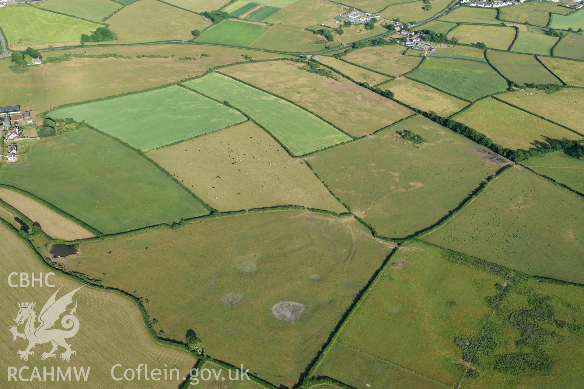 Royal Commission aerial photography of earthworks southwest of Llanddewi Church, with parching, taken on 17th July 2018 during the 2018 drought.