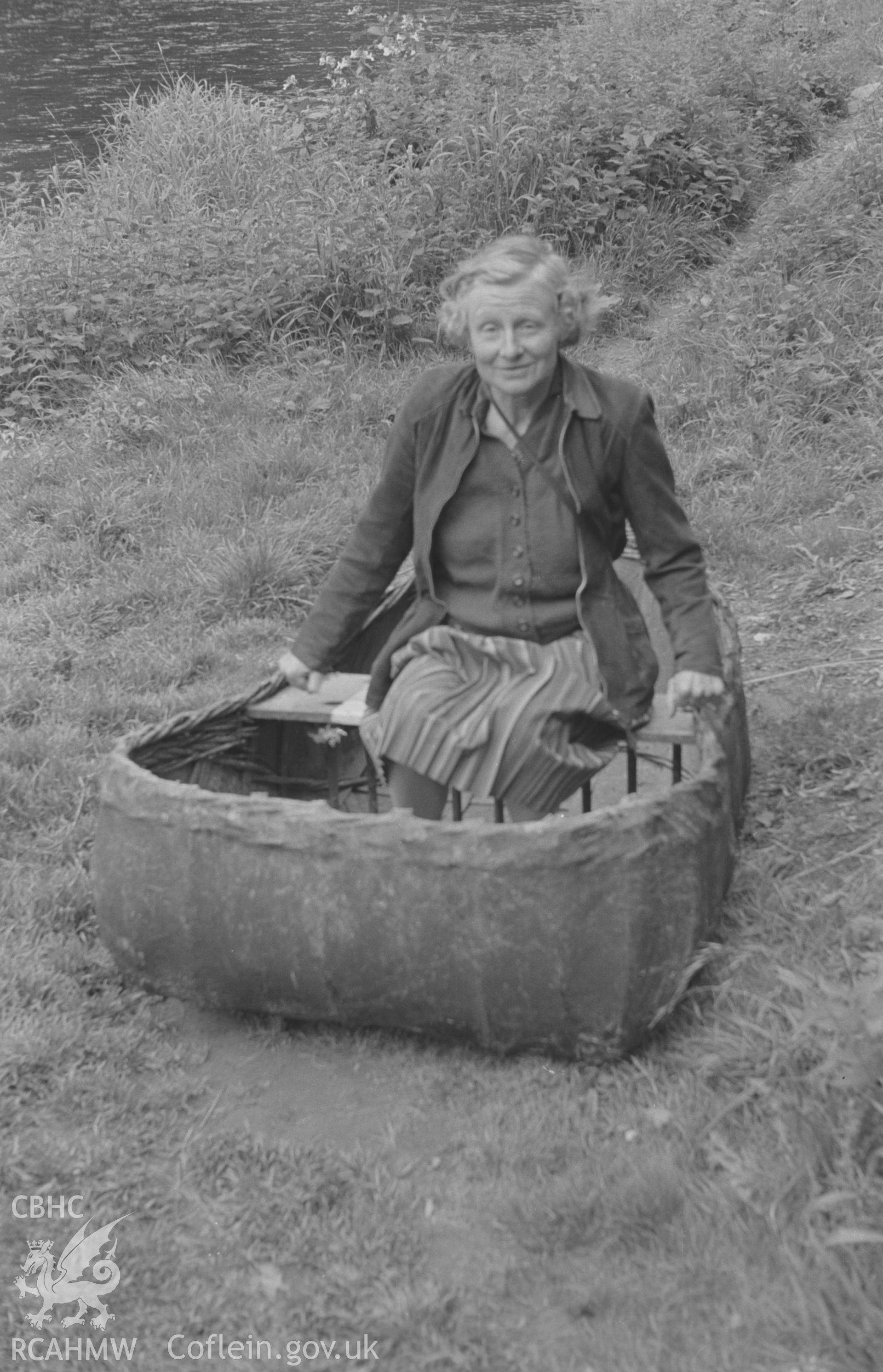 Digital copy of a black and white negative showing a coracle on path near the Teifi below the castle at Cilgerran. Photographed in September 1963 by Arthur O. Chater from Grid Reference SN 1950 4322.