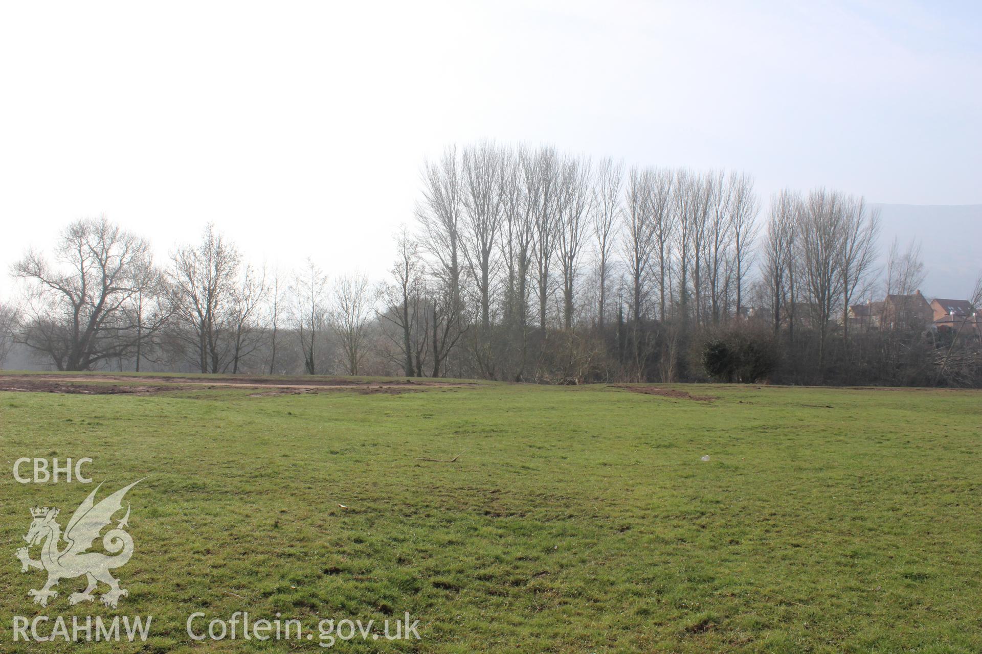 'View from the centre of proposed Site A towards the south.' Photographed on site visit for archaeological desk based assessment of the proposed Eisteddfod Site at Castle Meadows and Llanfoist, Abergavenny, carried out by Archaeology Wales, 2014.