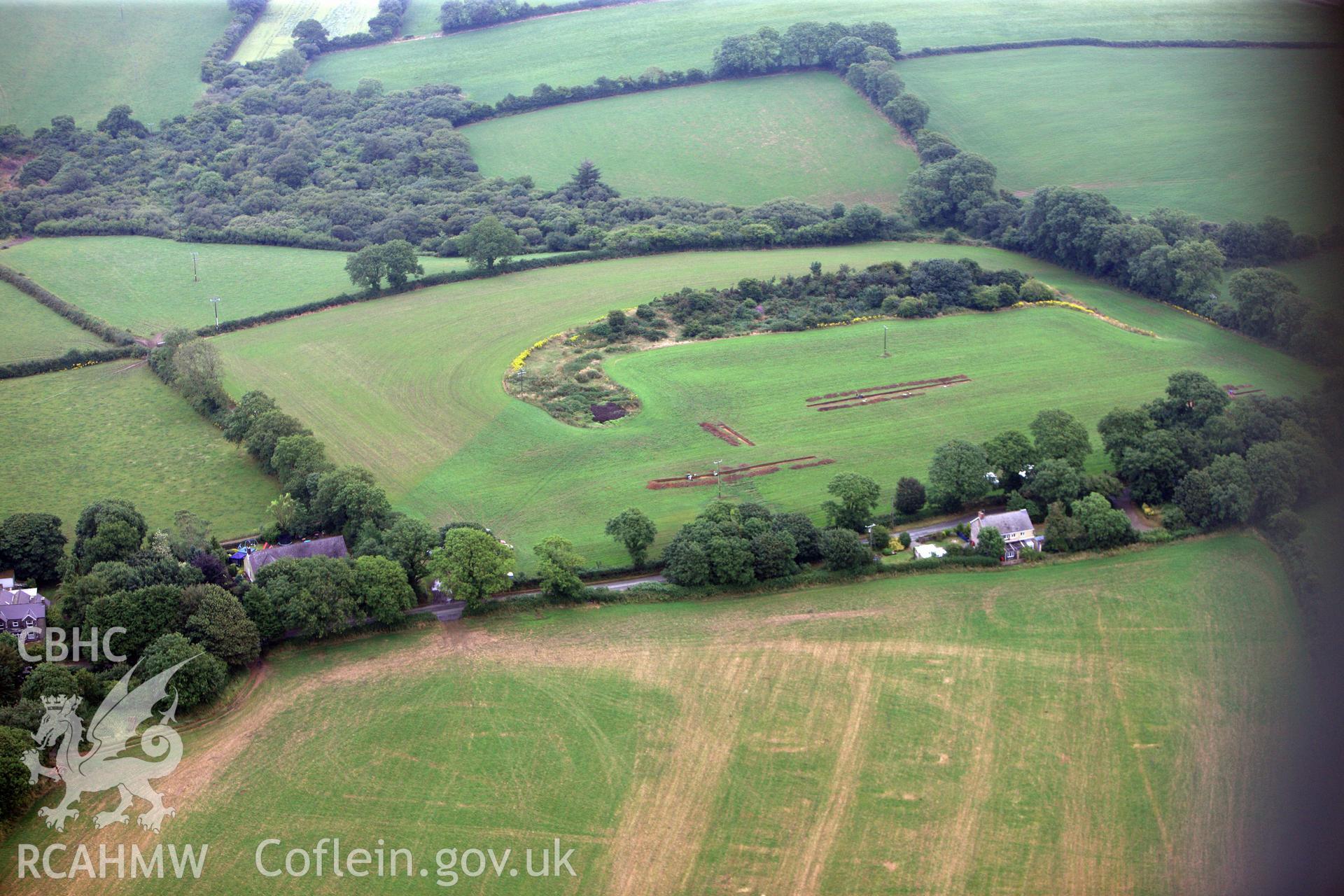 Wiston Roman Fort with excavations by Dyfed Archaeological Trust, north east of Haverfordwest. Oblique aerial photograph taken during the Royal Commission?s programme of archaeological aerial reconnaissance by Toby Driver on 1st August 2013.