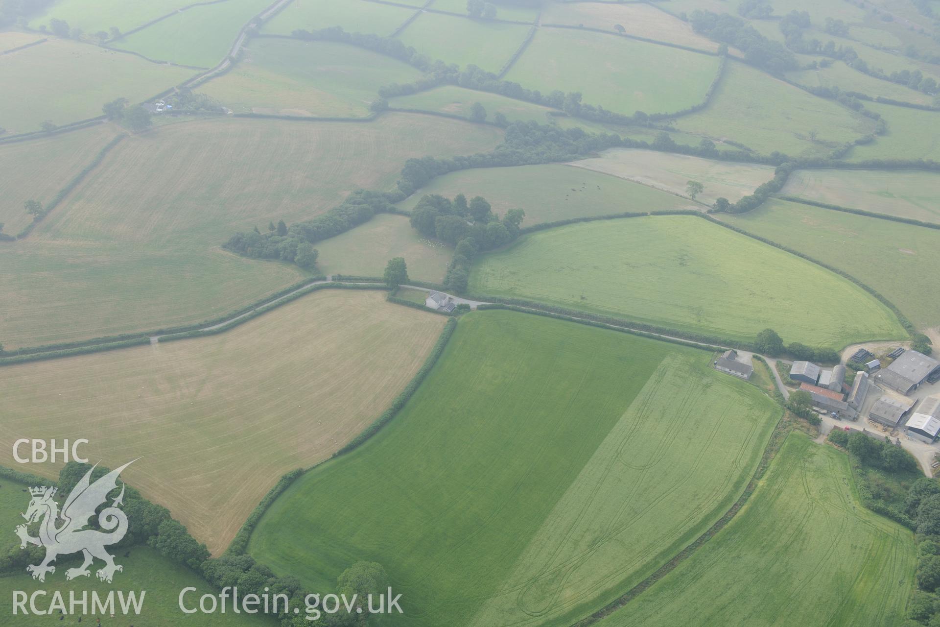 Royal Commission aerial photography of Llangan Church recorded during drought conditions on 22nd July 2013.