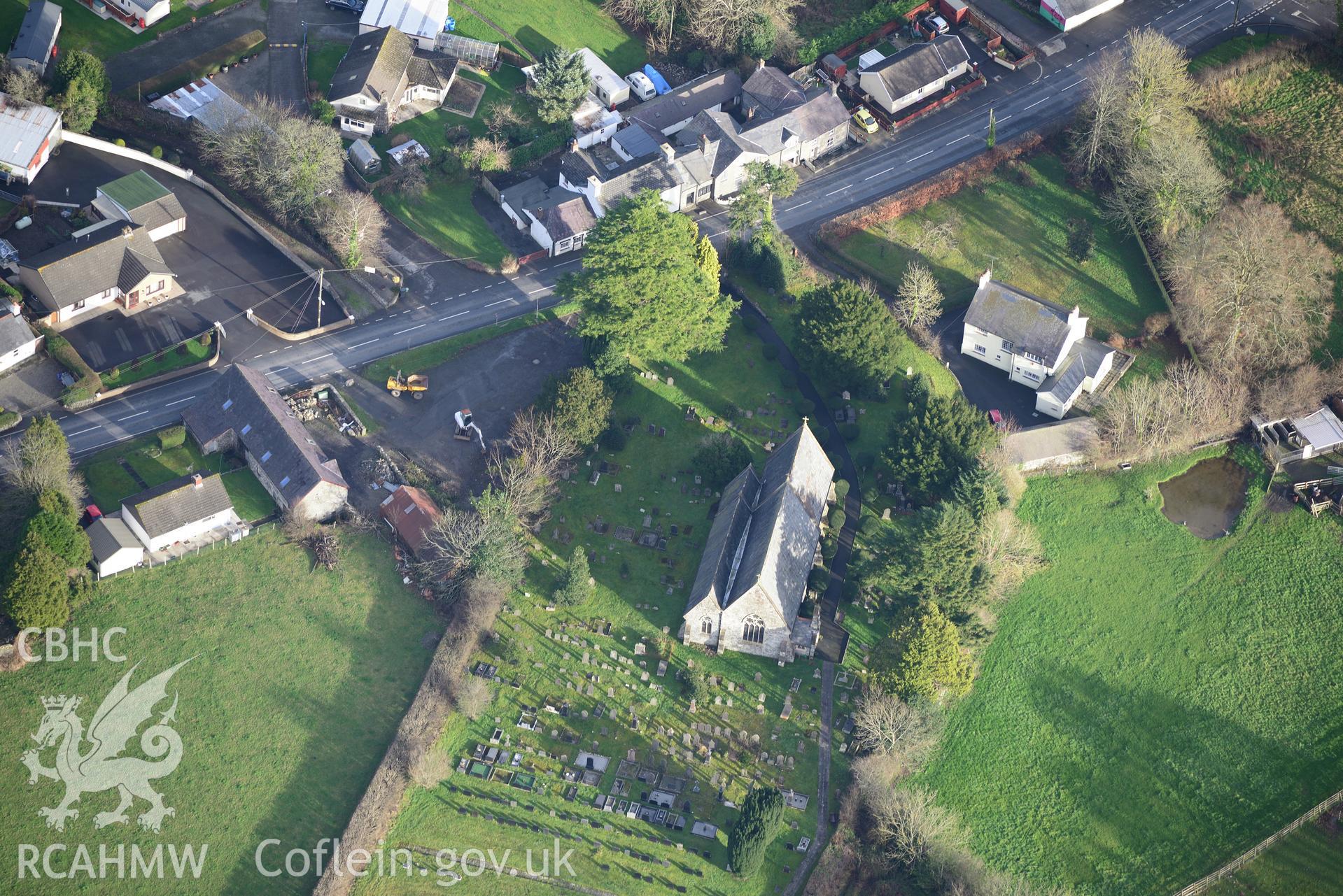 Ystrad Aeron village including St. Michael's Church. Oblique aerial photograph taken during the Royal Commission's programme of archaeological aerial reconnaissance by Toby Driver on 6th January 2015.