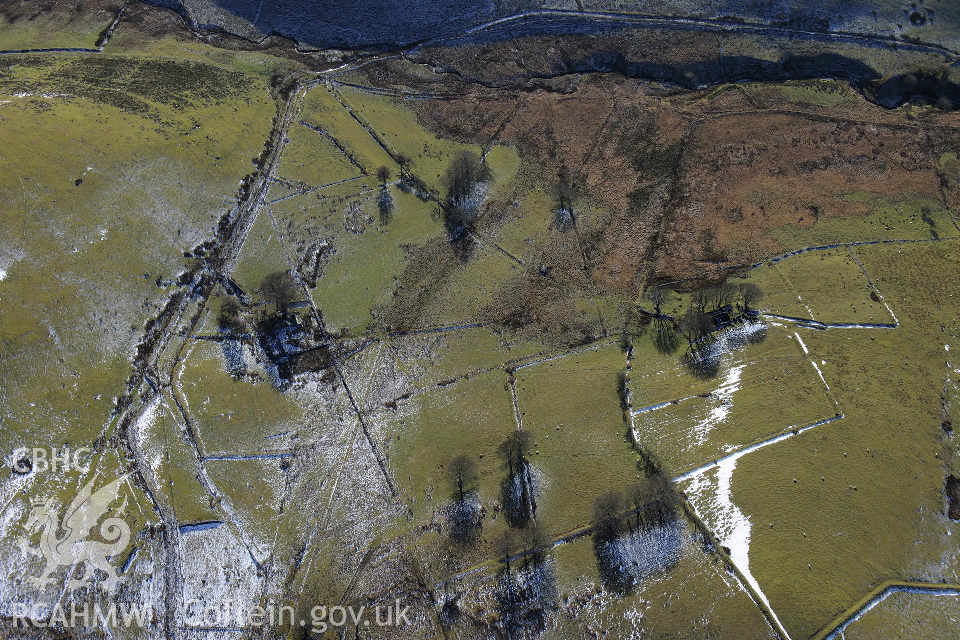 Gwar Ffynnon - an area of deserted farmsteads east of Tregaron. Oblique aerial photograph taken during the Royal Commission's programme of archaeological aerial reconnaissance by Toby Driver on 4th February 2015.