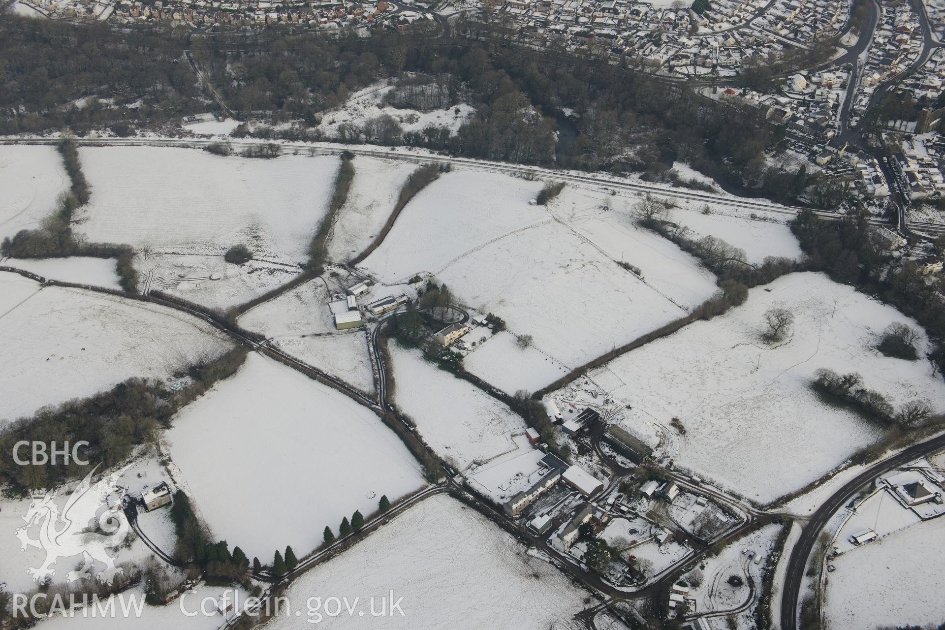 Miskin Roman Fort, Miskin, Pontyclun. Oblique aerial photograph taken during the Royal Commission?s programme of archaeological aerial reconnaissance by Toby Driver on 24th January 2013.