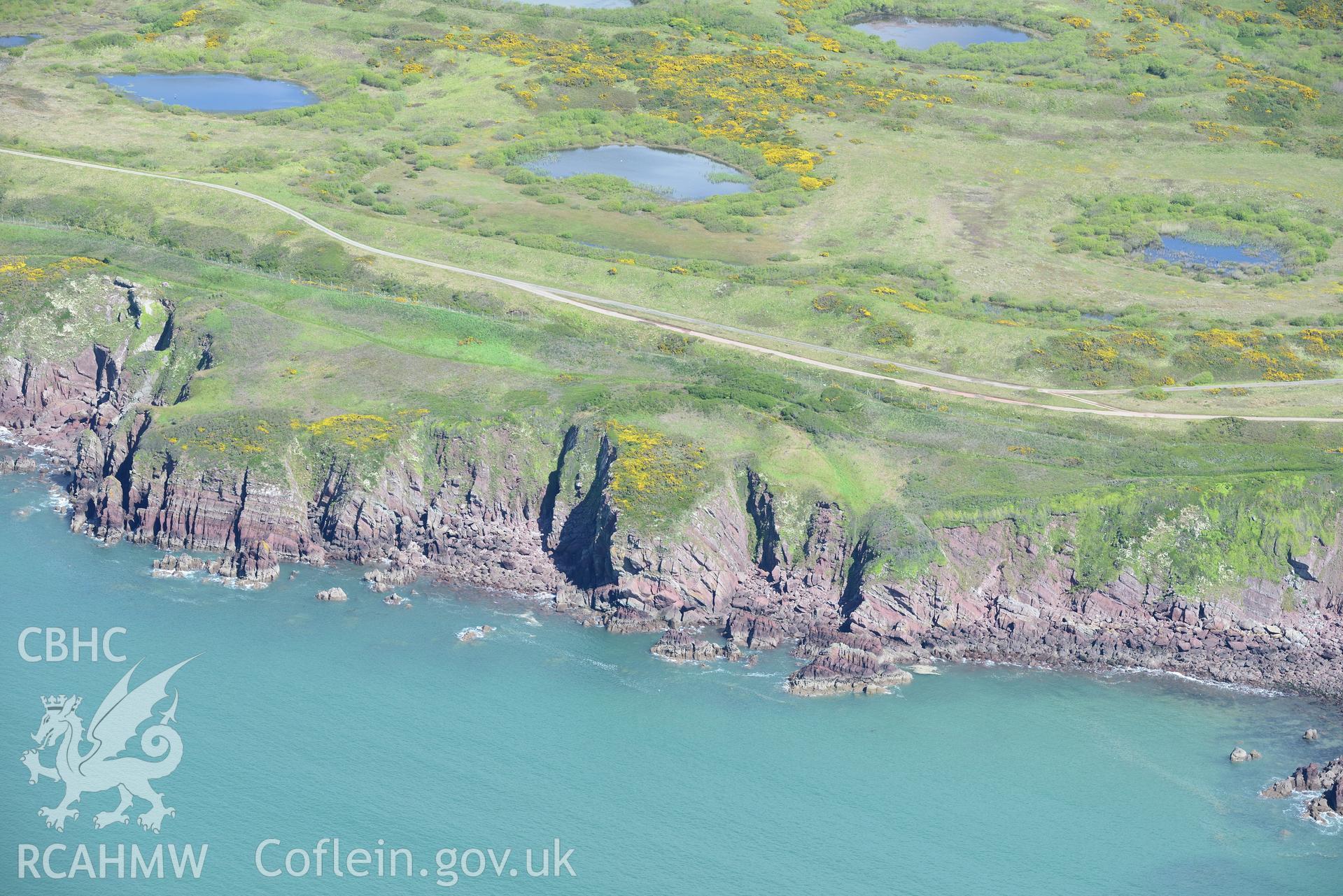 South Hook Rath defended enclosur, near Milford Haven. Oblique aerial photograph taken during the Royal Commission's programme of archaeological aerial reconnaissance by Toby Driver on 13th May 2015.