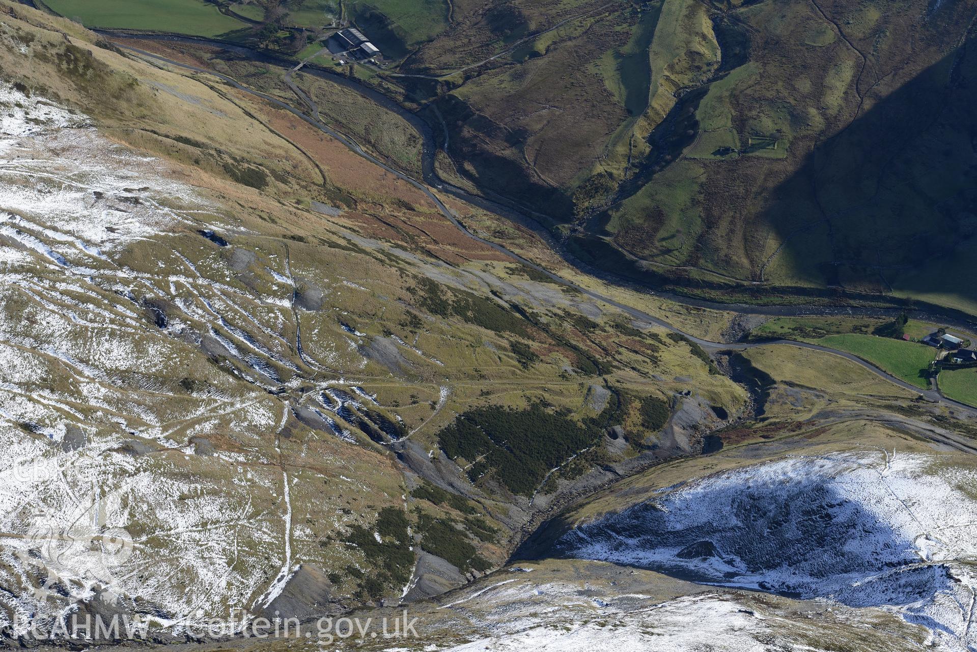 Former Copa Hill opencast mine and Pengeulan Medieval lead smelting boles, Cwmystwyth, south west of Llangurig. Oblique aerial photograph taken during the Royal Commission's programme of archaeological aerial reconnaissance by Toby Driver on 4th February 2015.