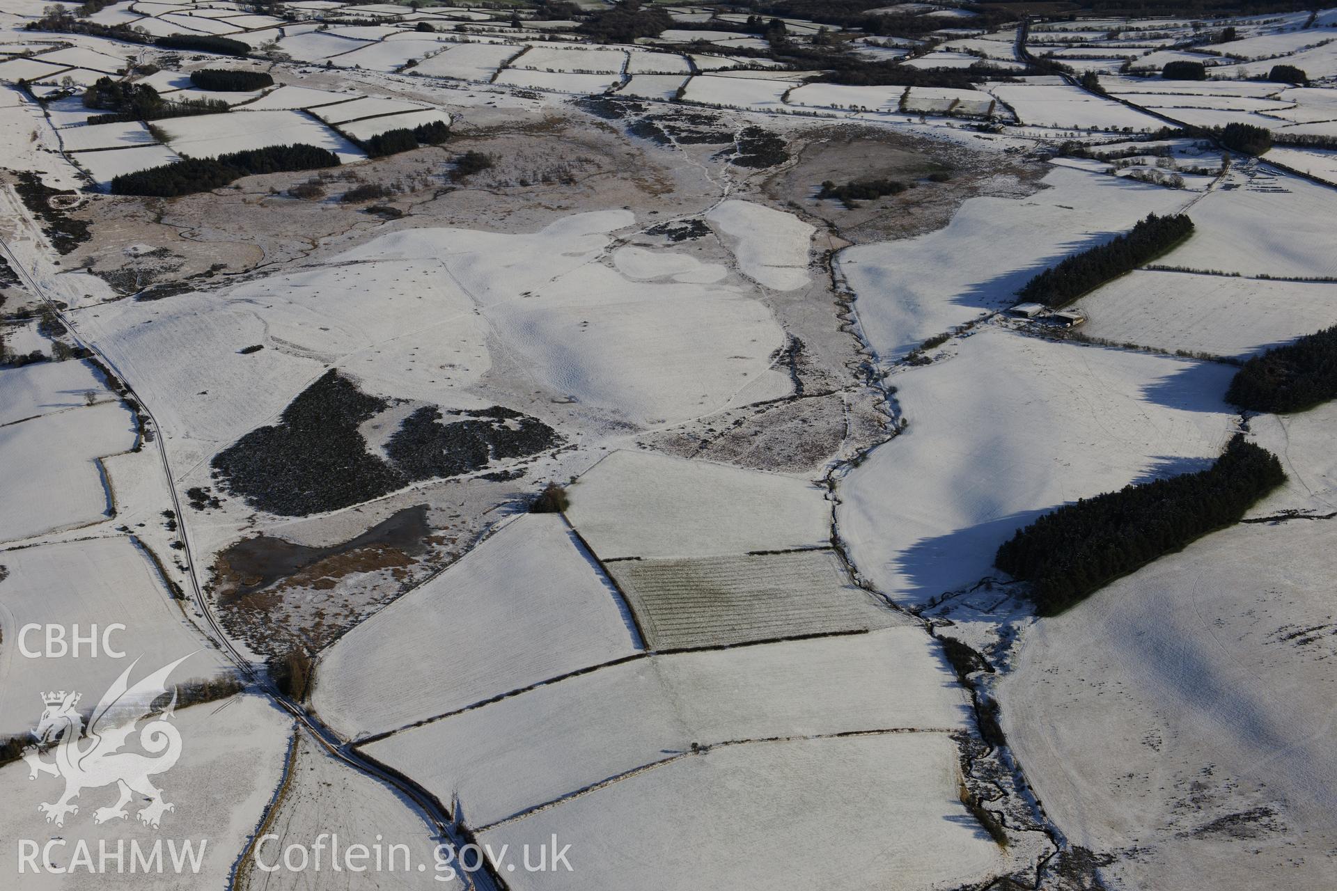 The south western section of the Roman road on Mynydd Illtyd, south west of Brecon. Oblique aerial photograph taken during the Royal Commission?s programme of archaeological aerial reconnaissance by Toby Driver on 15th January 2013.