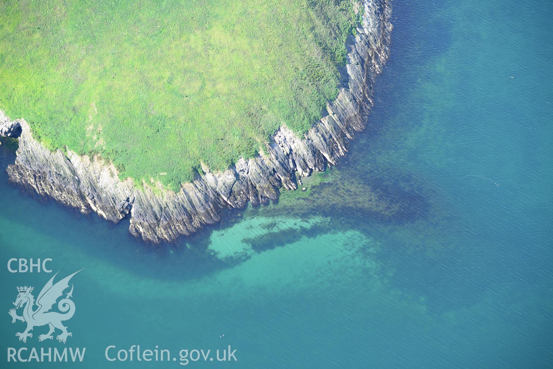 Fish trap at St Tudwal's Island (east). Oblique aerial photograph taken during the Royal Commission's programme of archaeological aerial reconnaissance by Toby Driver on 23rd June 2015.