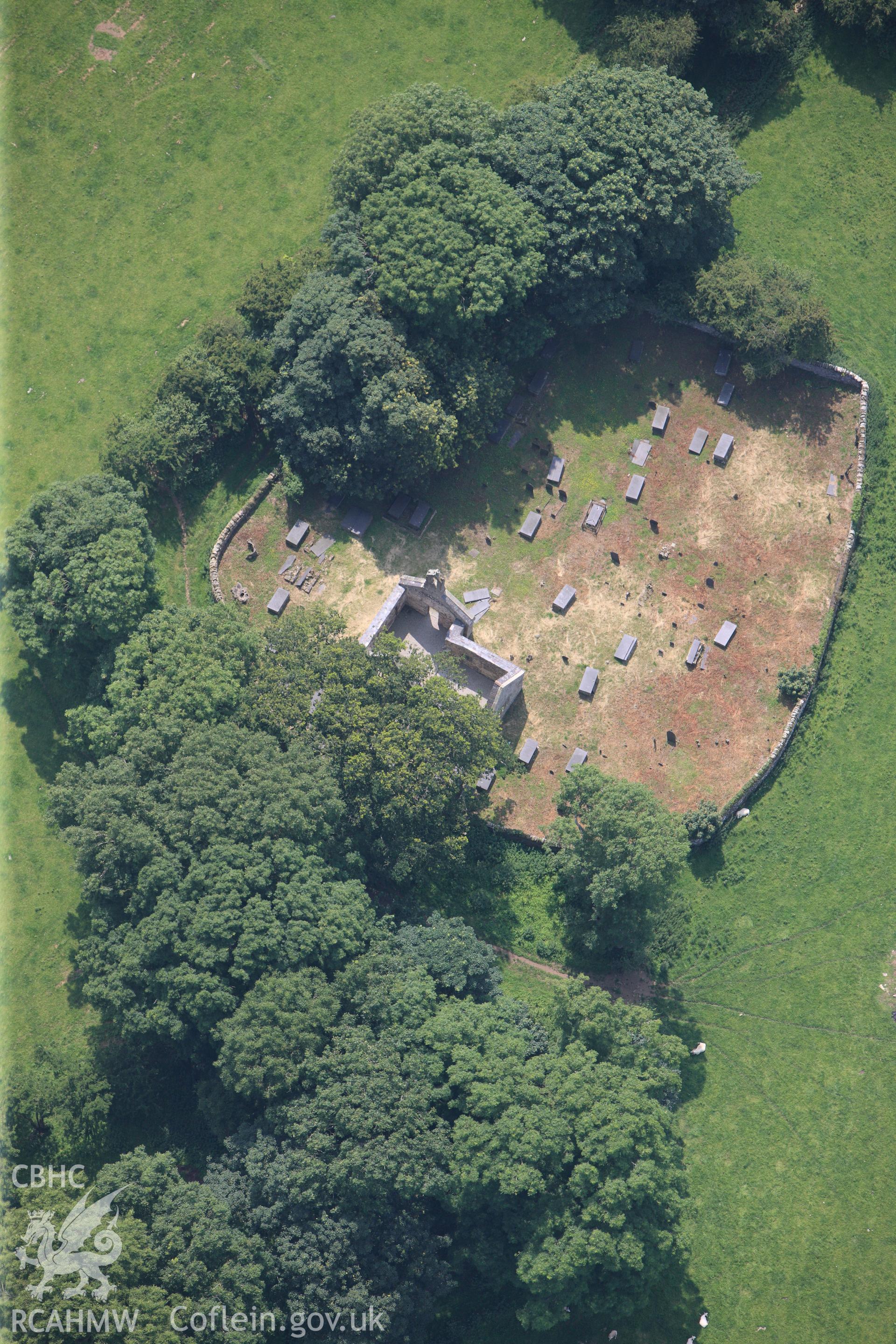 The site of St Michael's old church, Gaerwen, Llangefni, Anglesey. Oblique aerial photograph taken during the Royal Commission?s programme of archaeological aerial reconnaissance by Toby Driver on 12th July 2013.