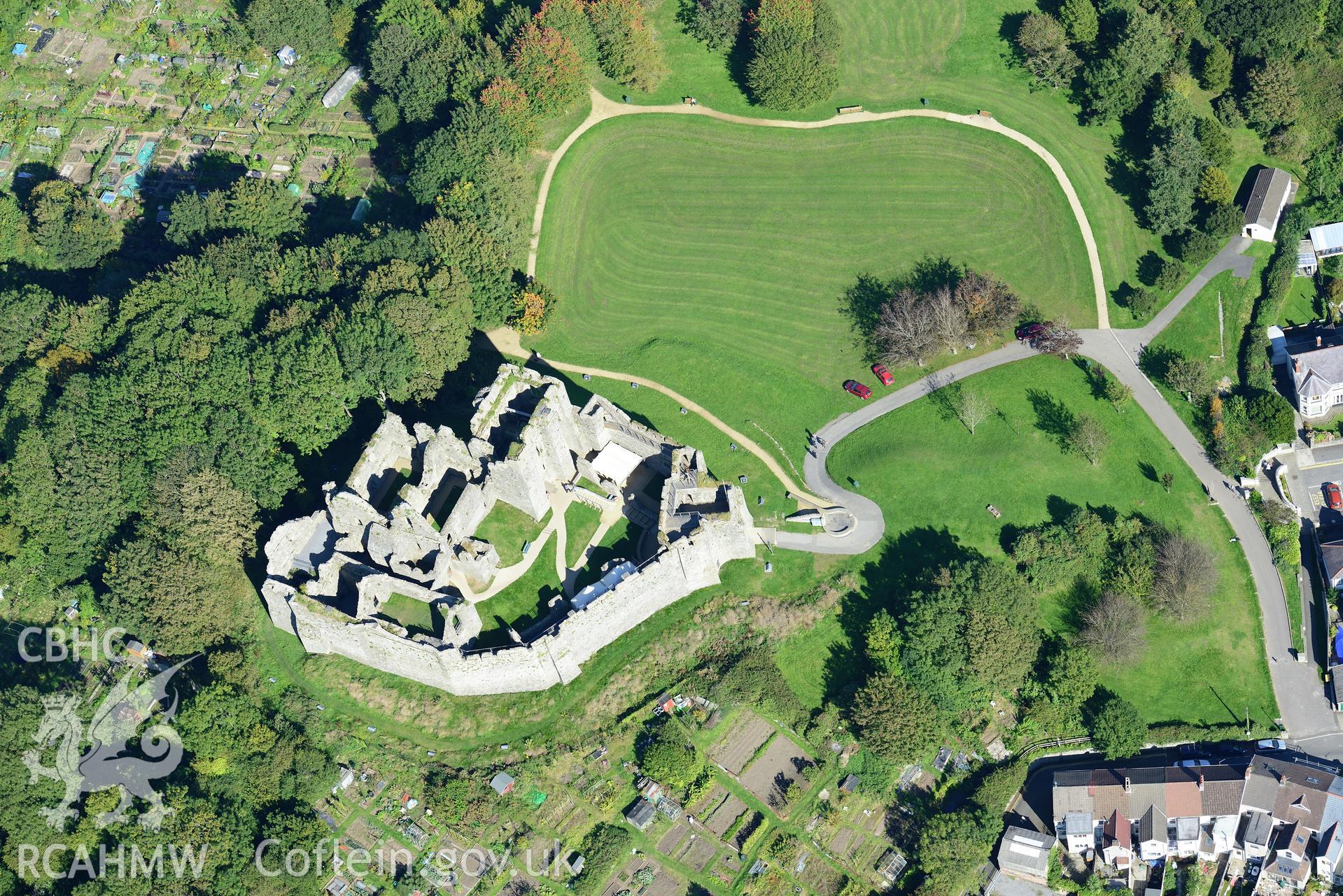 Oystermouth castle, near the Mumbles, south west of Swansea. Oblique aerial photograph taken during the Royal Commission's programme of archaeological aerial reconnaissance by Toby Driver on 30th September 2015.