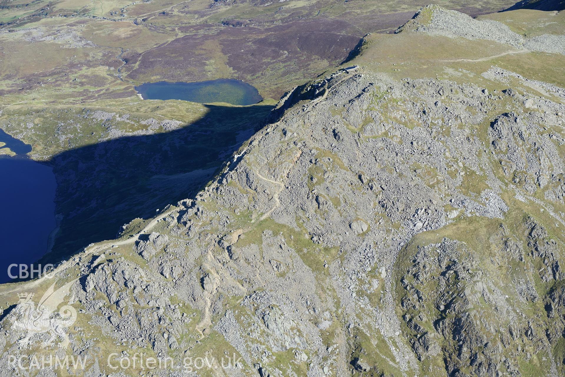 Penygadair - the summit of Cadair Idris. Oblique aerial photograph taken during the Royal Commission's programme of archaeological aerial reconnaissance by Toby Driver on 2nd October 2015.