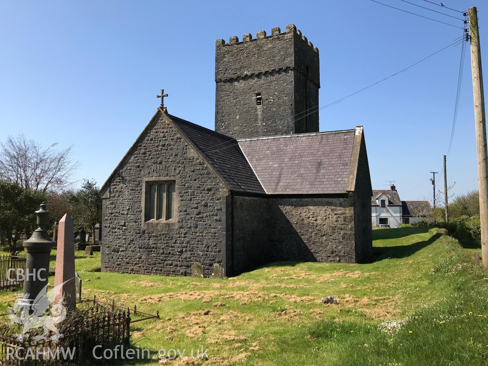 Colour photo showing exterior view of St. Lawrence's church and graveyard, Marros, taken by Paul R. Davis, 6th May 2018.