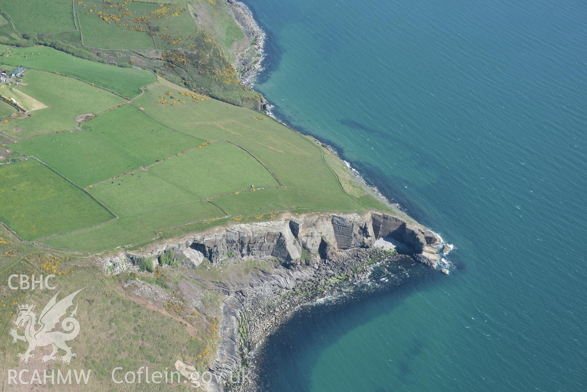 Aerial photography of Cilan Uchaf chambered tomb taken on 3rd May 2017.  Baseline aerial reconnaissance survey for the CHERISH Project. ? Crown: CHERISH PROJECT 2017. Produced with EU funds through the Ireland Wales Co-operation Programme 2014-2020. All material made freely available through the Open Government Licence.