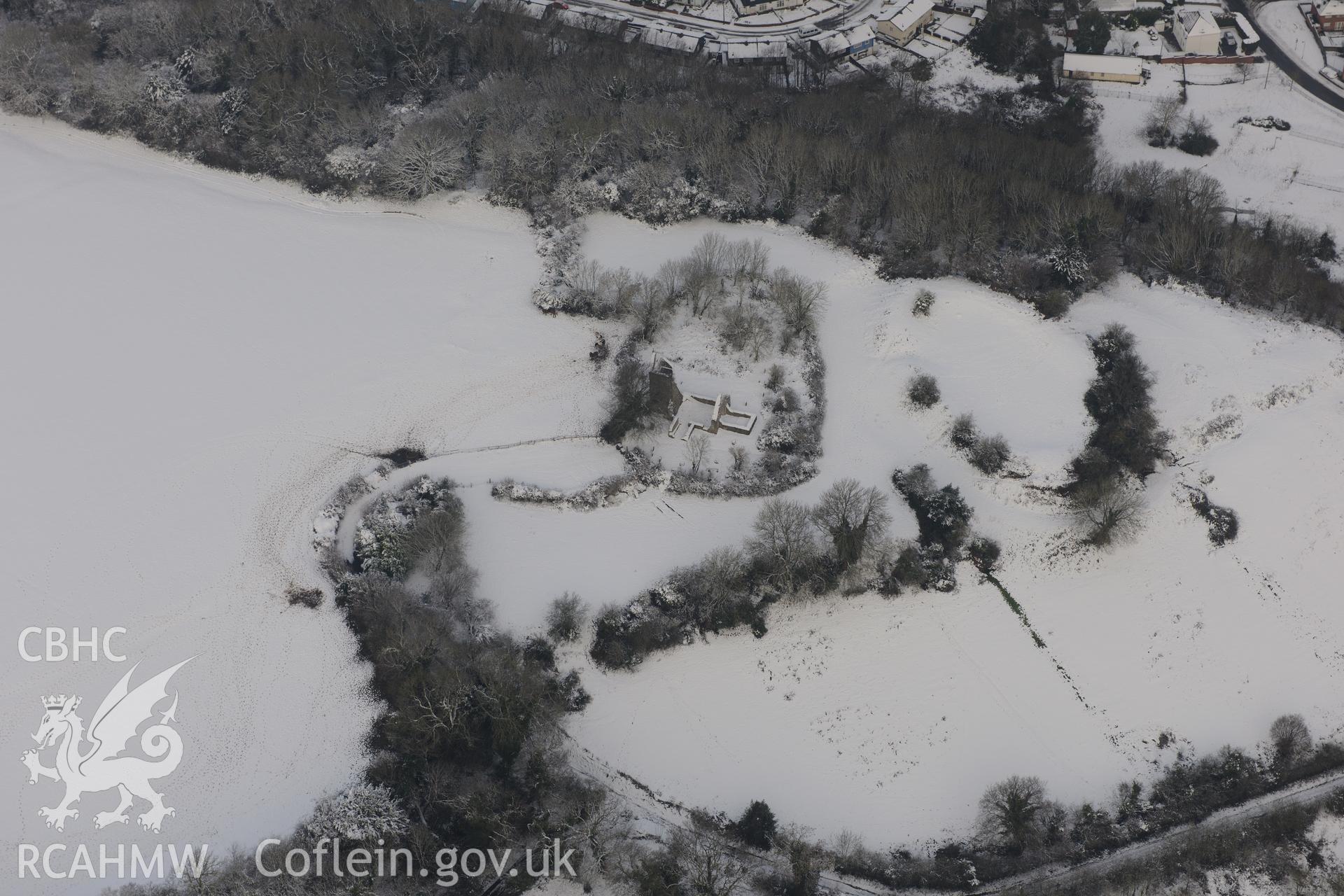 St Mary's church and Caerau Castle ringwork, Caerau, Cardiff. Oblique aerial photograph taken during the Royal Commission?s programme of archaeological aerial reconnaissance by Toby Driver on 24th January 2013.