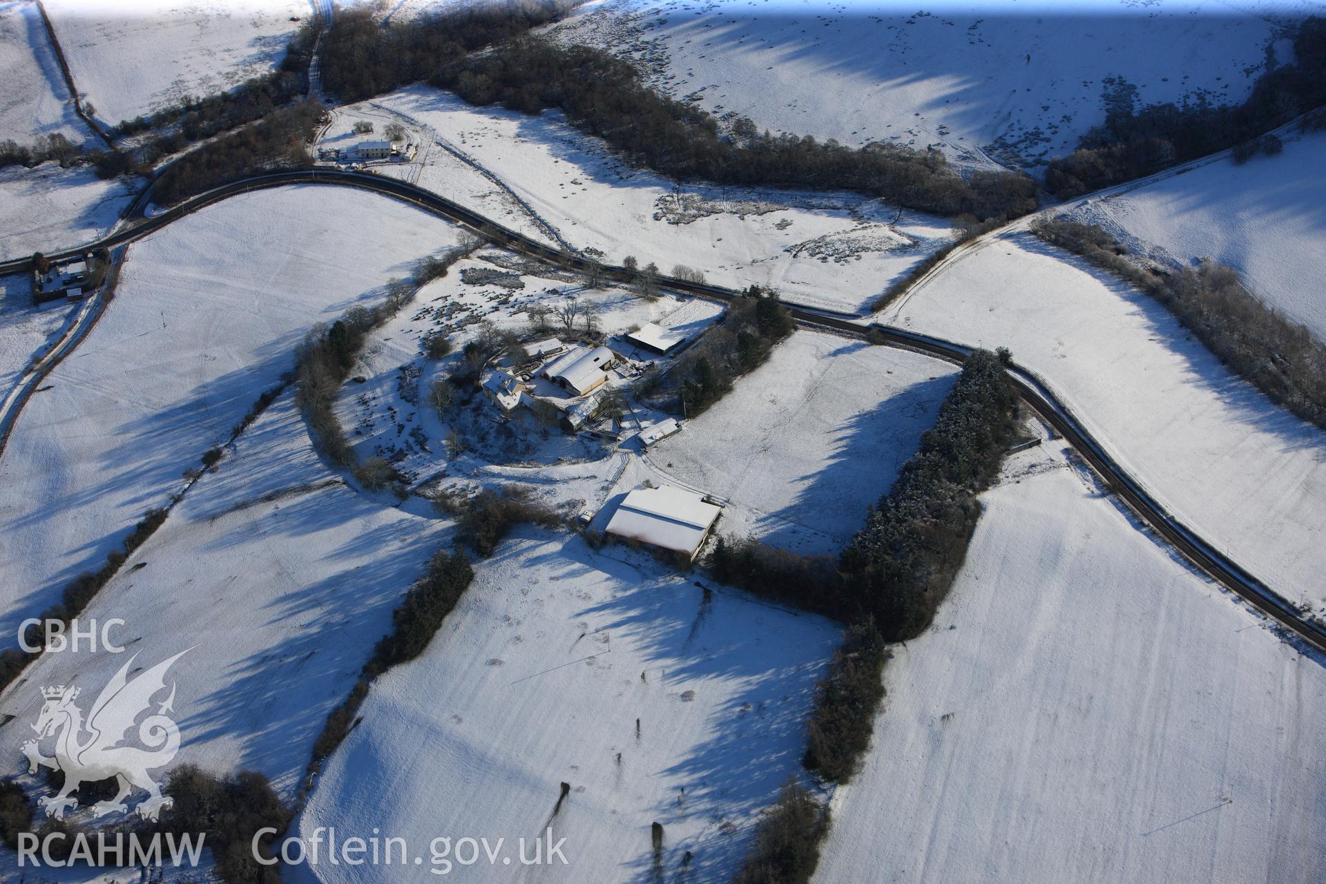 Colwyn Castle, the Roman fort at Colwyn Castle and Fforest farm, Glascwm, north east of Builth Wells. Oblique aerial photograph taken during the Royal Commission?s programme of archaeological aerial reconnaissance by Toby Driver on 15th January 2013.