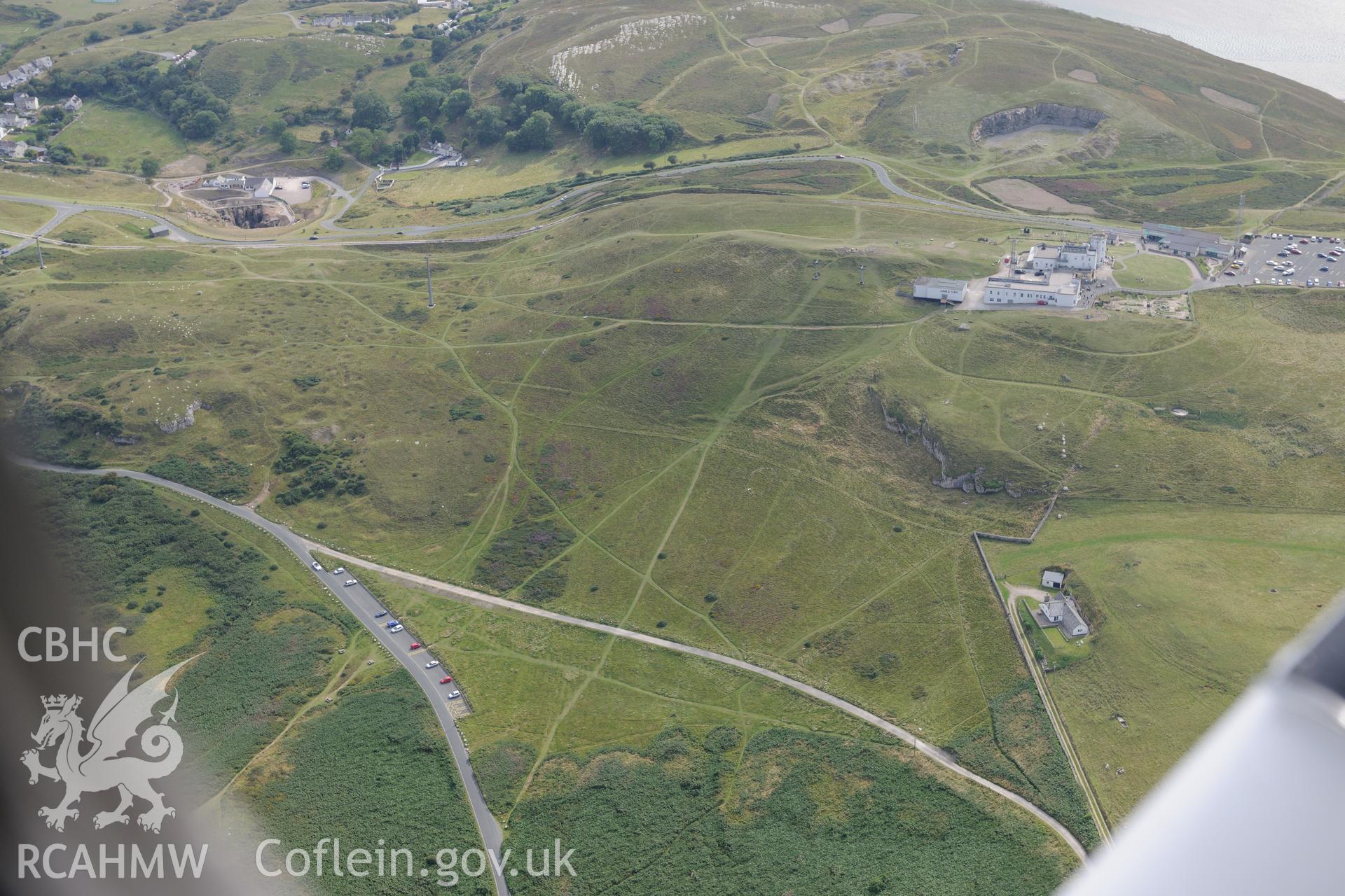 Great Orme visitors centre and golf course, White Farm and a deserted rural settlement, Great Orme, Llandudno. Oblique aerial photograph taken during the Royal Commission's programme of archaeological aerial reconnaissance by Toby Driver on 11th September 2015.