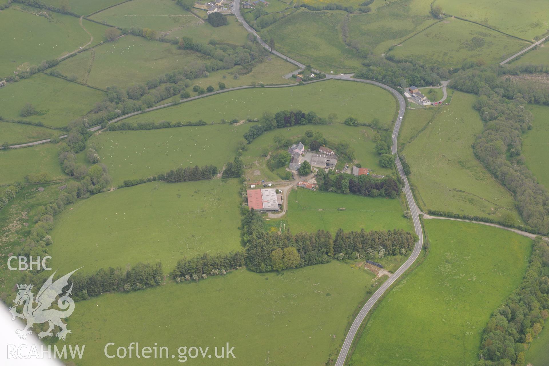 Colwyn Castle, Colwyn Castle Roman fort and Fforest Farmhouse, near Builth Wells. Oblique aerial photograph taken during the Royal Commission's programme of archaeological aerial reconnaissance by Toby Driver on 11th June 2015.