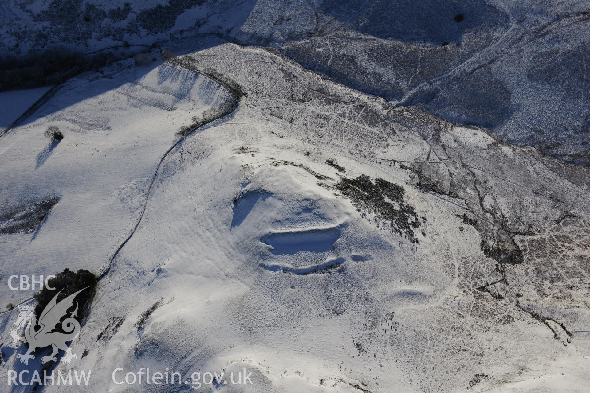 Cwm Berwyn defended enclosure, north east of Builth Wells. Oblique aerial photograph taken during the Royal Commission?s programme of archaeological aerial reconnaissance by Toby Driver on 15th January 2013.