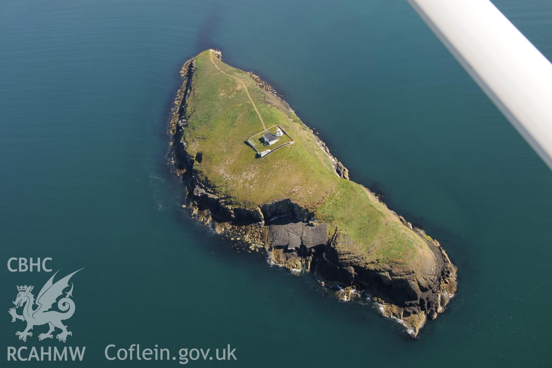 St Tudwal's Island West and its lighthouse. Oblique aerial photograph taken during the Royal Commission's programme of archaeological aerial reconnaissance by Toby Driver on 23rd June 2015.