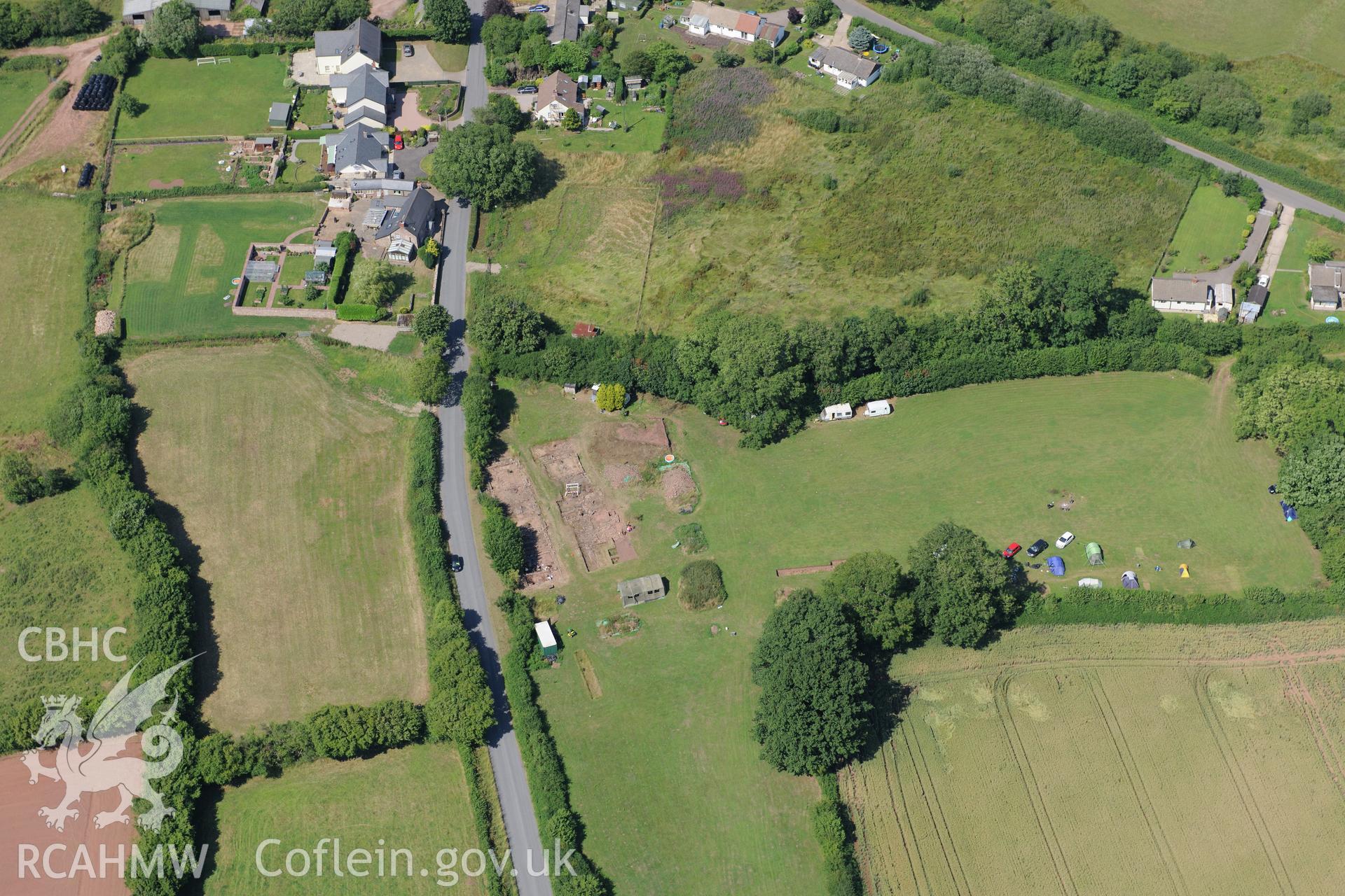 Excavations immediately south of Trellech shrunken medieval village. Oblique aerial photograph taken during the Royal Commission?s programme of archaeological aerial reconnaissance by Toby Driver on 1st August 2013.