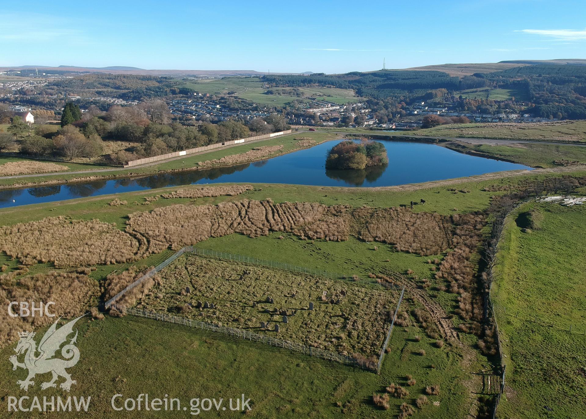 View from the west of the Tredegar Ironworks cholera cemetery, with George Town, Tredegar, beyond. Colour photograph taken by Paul R. Davis on 24th October 2018.