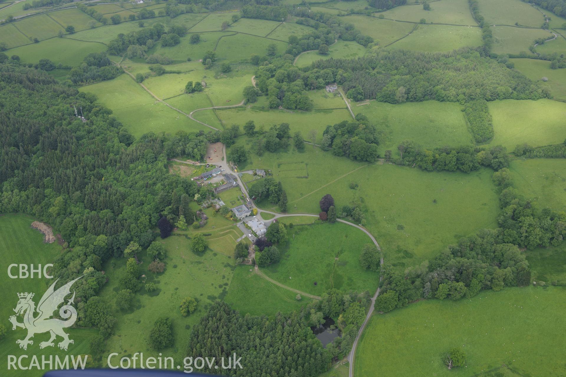 Cefn Dyrys estate including home farm, garden, stables and garden cottage, near Builth Wells. Oblique aerial photograph taken during the Royal Commission's programme of archaeological aerial reconnaissance by Toby Driver on 11th June 2015.