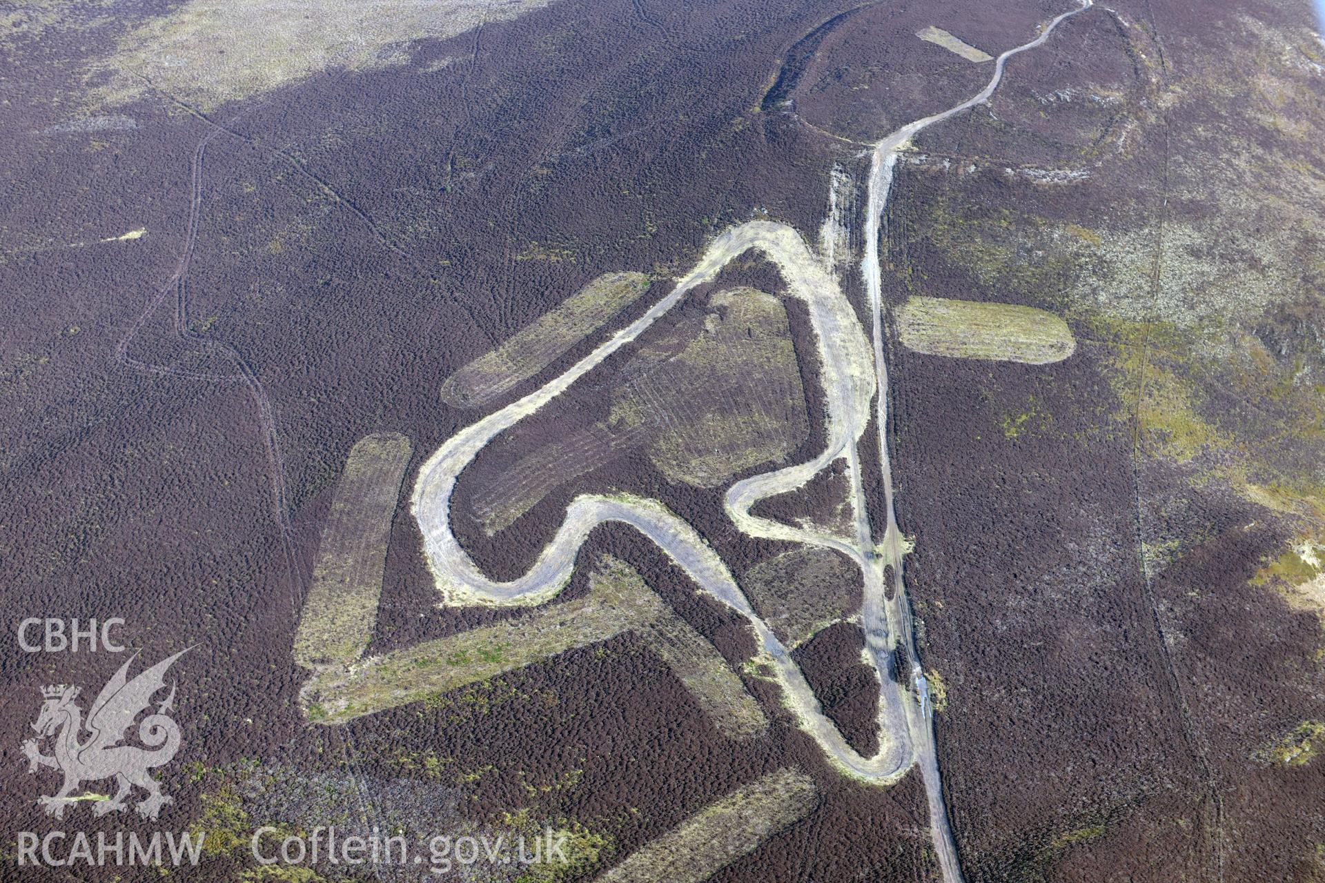 Moel-y-Gair hillfort on Llantysilio mountain, north west of Llangollen. Oblique aerial photograph taken during the Royal Commission?s programme of archaeological aerial reconnaissance by Toby Driver on 28th February 2013.