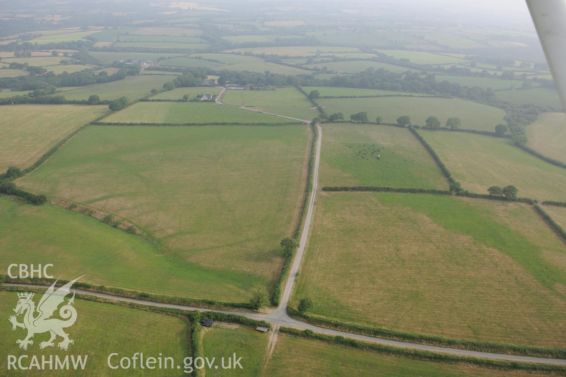 Royal Commission aerial photography of the possible Roman road line near West Dairy recorded during drought conditions on 22nd July 2013.