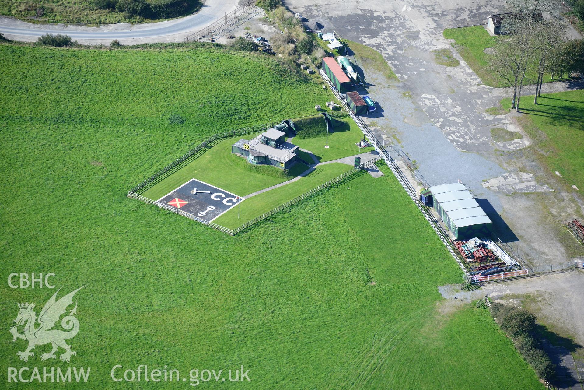 Carew Cheriton Control Tower at Carew Cheriton airfield, east of Pembroke Dock. Oblique aerial photograph taken during the Royal Commission's programme of archaeological aerial reconnaissance by Toby Driver on 30th September 2015.