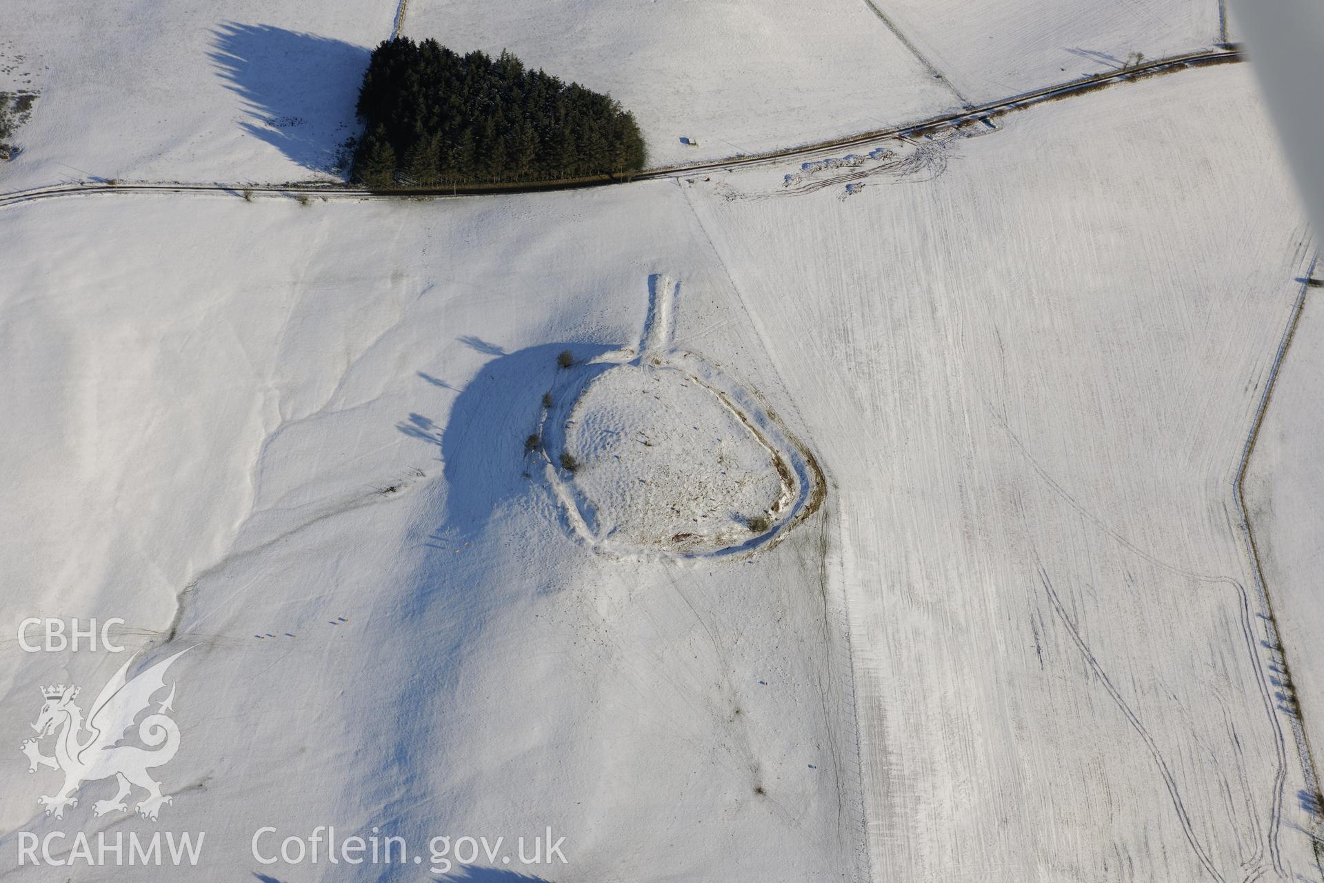 Twyn-y-Gaer defended enclosure. Oblique aerial photograph taken during the Royal Commission?s programme of archaeological aerial reconnaissance by Toby Driver on 15th January 2013.