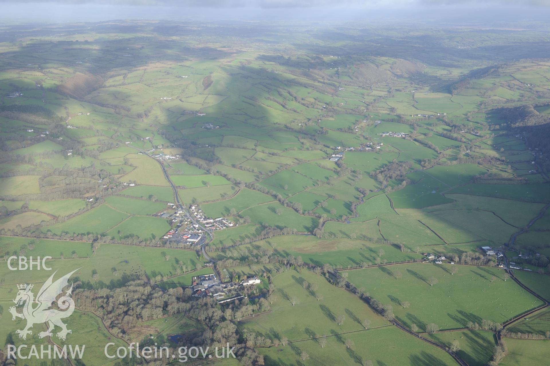 Talsarn village, and Llanllyr manison and gardens. Oblique aerial photograph taken during the Royal Commission's programme of archaeological aerial reconnaissance by Toby Driver on 6th January 2015.