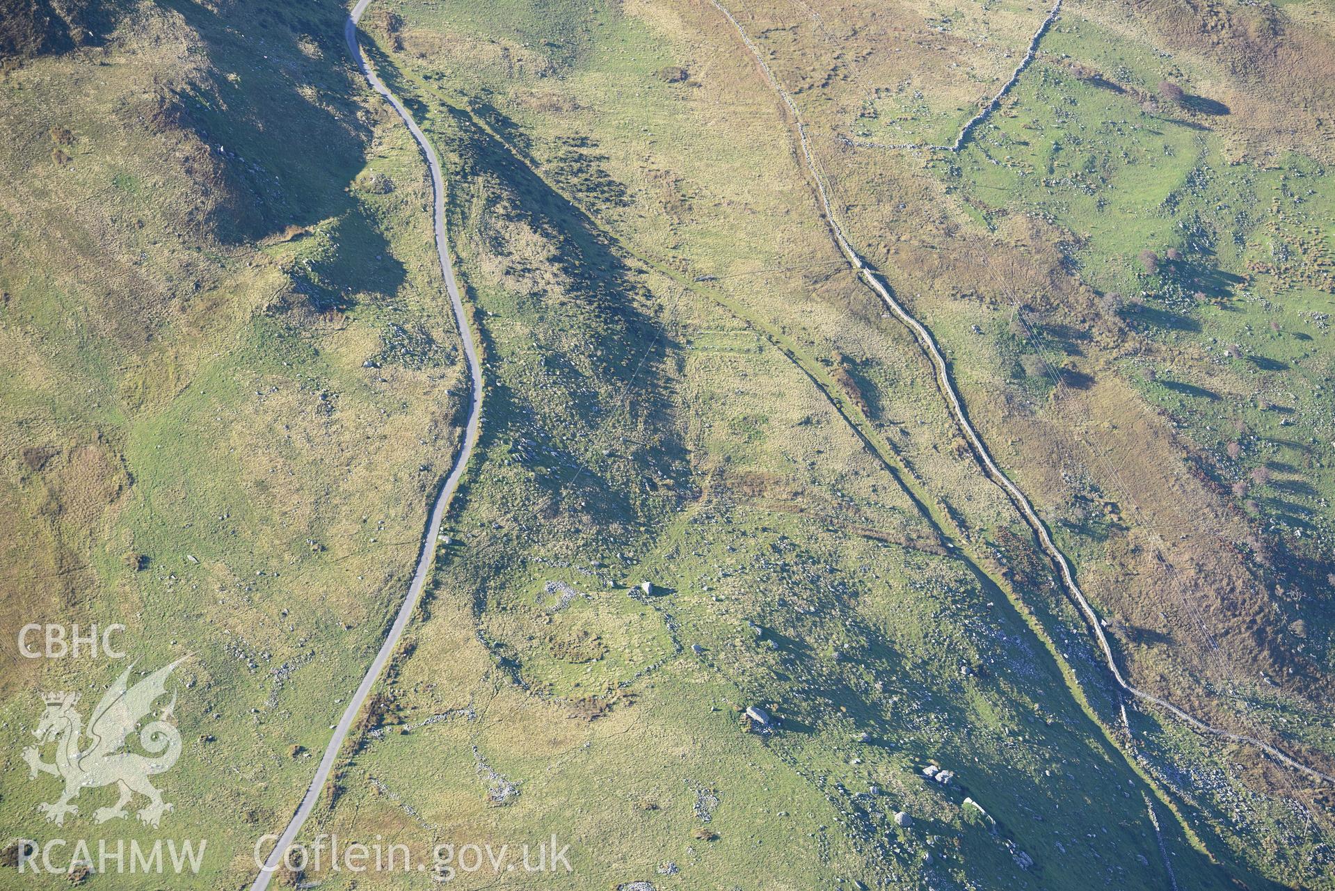 Bryn Seward settlement, south east of Fairbourne. Oblique aerial photograph taken during the Royal Commission's programme of archaeological aerial reconnaissance by Toby Driver on 2nd October 2015.