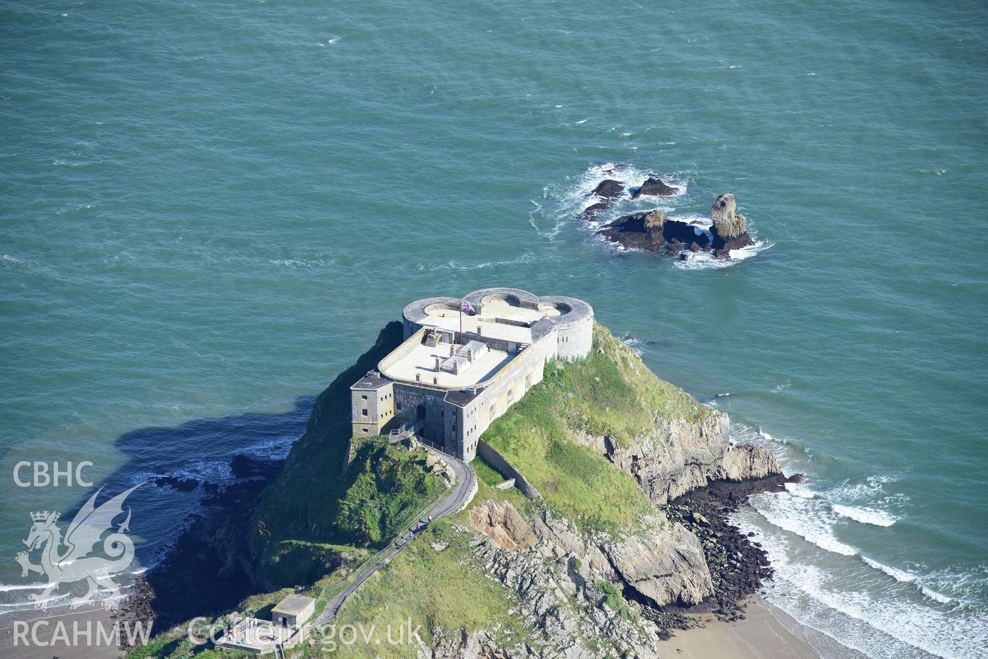 St. Catherine's Island, Tenby, including view of the fort and gun emplacement. Oblique aerial photograph taken during Royal Commission's programme of archaeological aerial reconnaissance by Toby Driver on 30th September 2015.