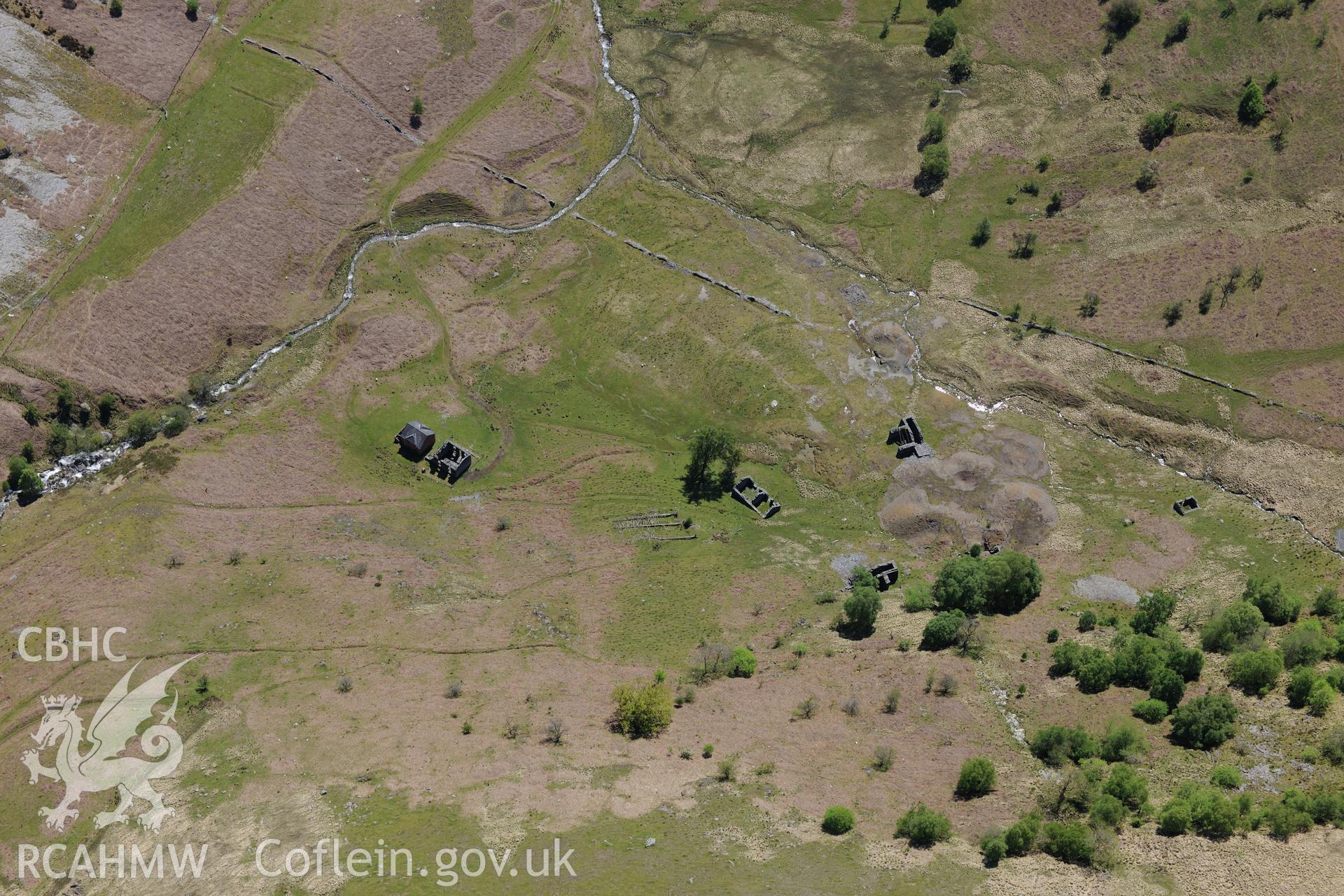 Cwm Elan lead mine complex, including the remains of a house, office, quarry, mine shaft and wheel pit. Oblique aerial photograph taken during the Royal Commission's programme of archaeological aerial reconnaissance by Toby Driver on 3rd June 2015.