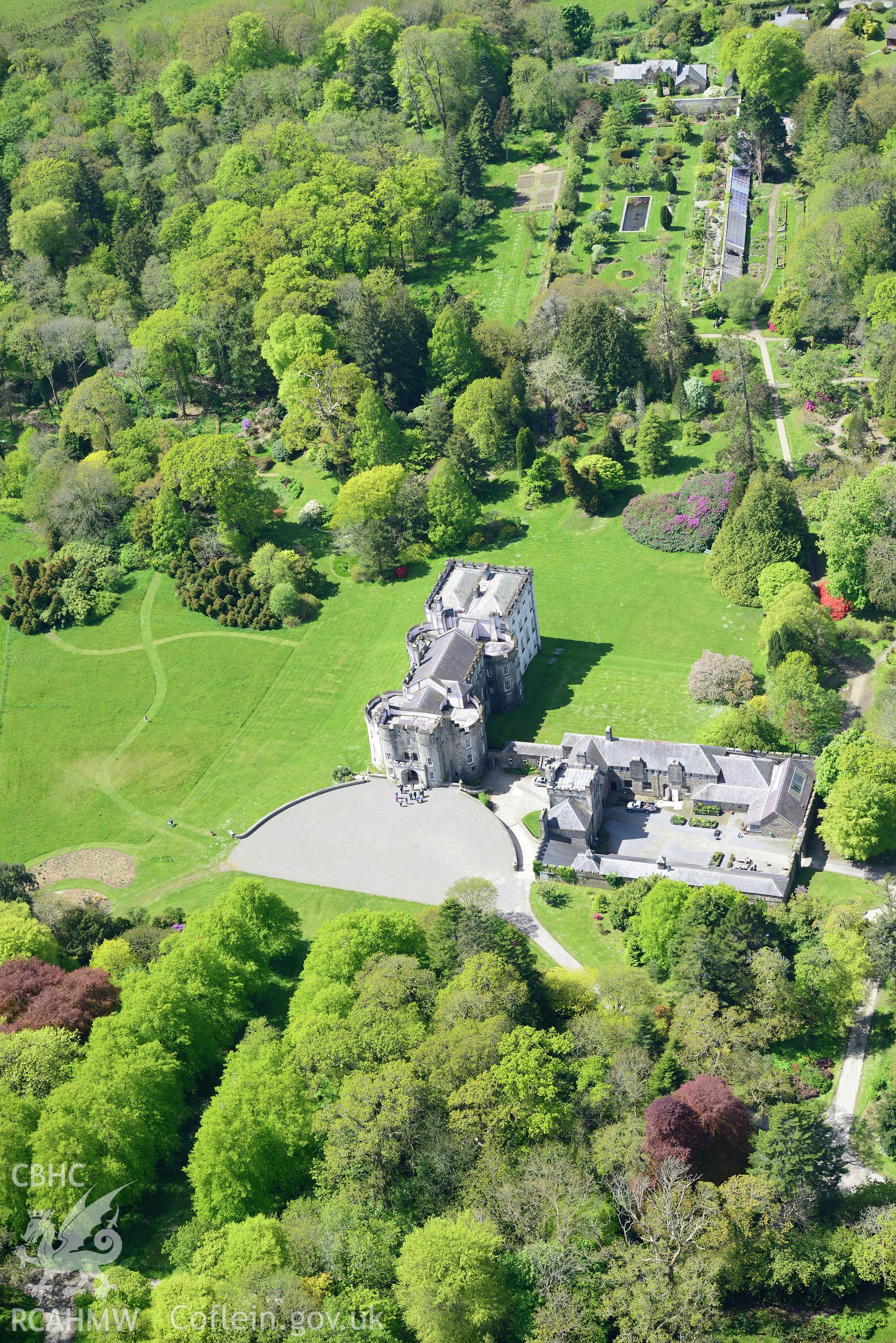 Picton Castle and gardens, Slebech. Oblique aerial photograph taken during the Royal Commission's programme of archaeological aerial reconnaissance by Toby Driver on 13th May 2015.