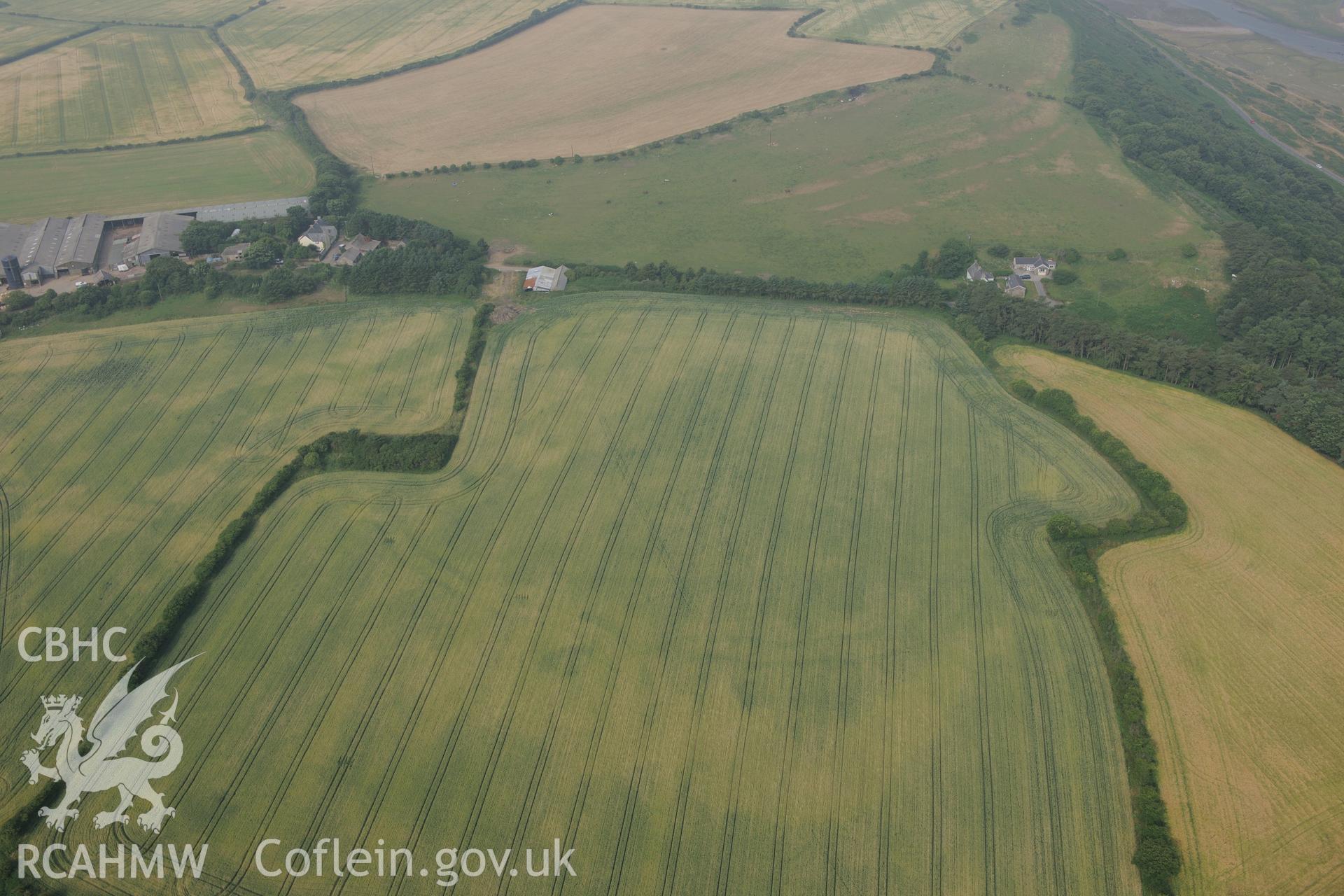 Royal Commission aerial photography of Norton causewayed enclosure cropmarks recorded during drought conditions on 22nd July 2013.