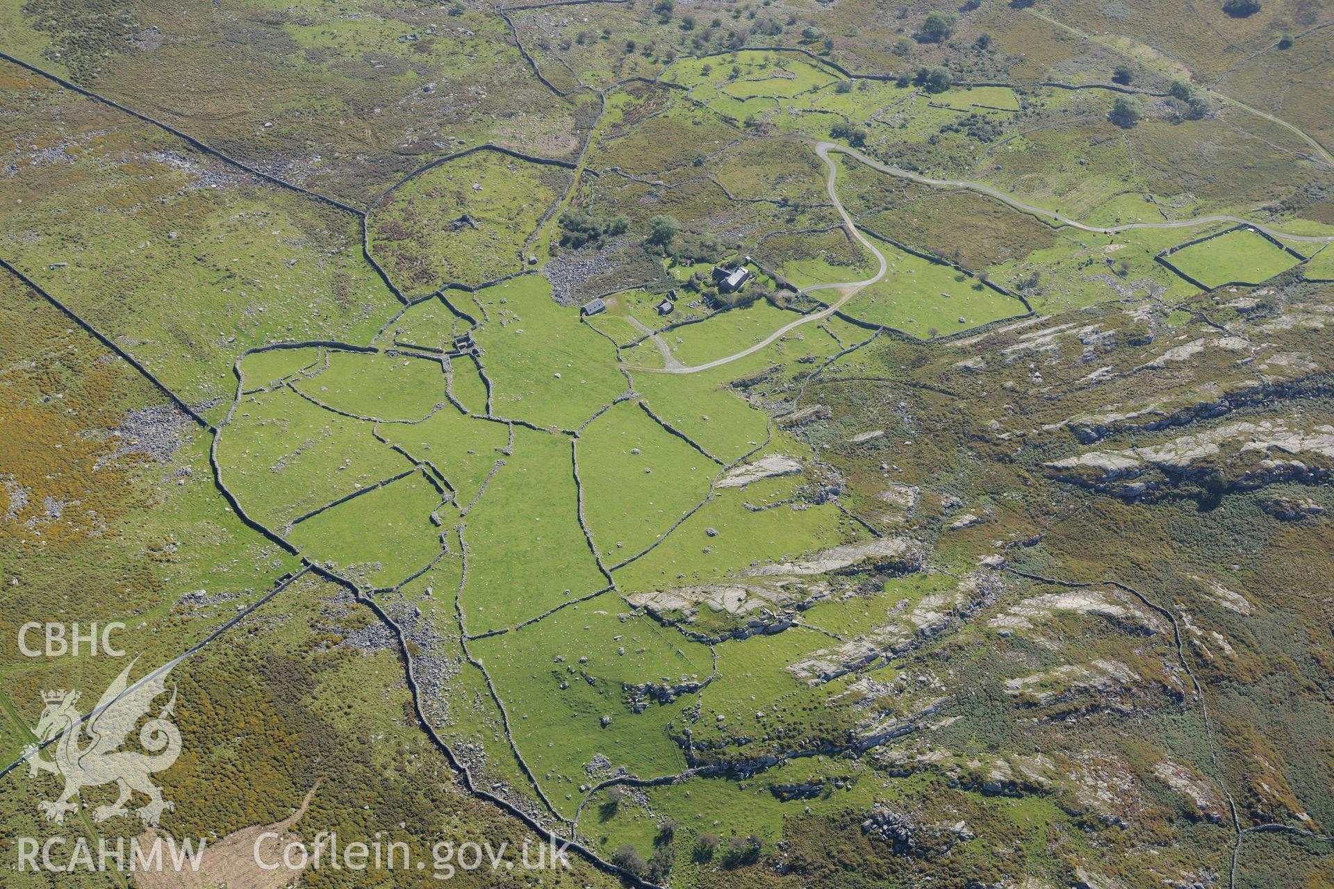 Caergynog Farm near Llanbedr, Harlech. Oblique aerial photograph taken during the Royal Commission's programme of archaeological aerial reconnaissance by Toby Driver on 2nd October 2015.