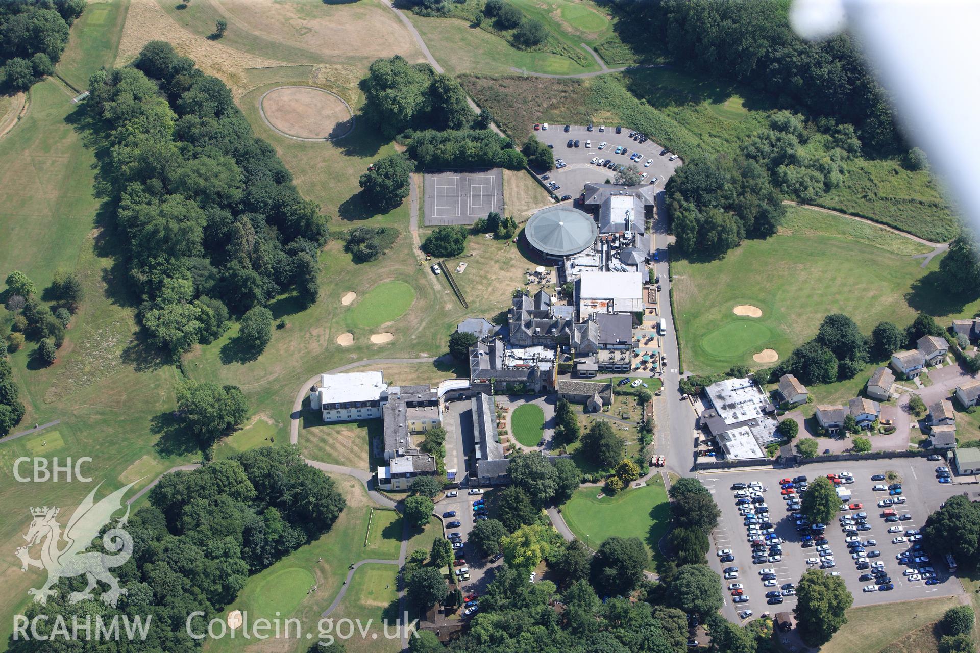 St Pierre church, house, garden and park, south west of Chepstow. Oblique aerial photograph taken during the Royal Commission?s programme of archaeological aerial reconnaissance by Toby Driver on 1st August 2013.