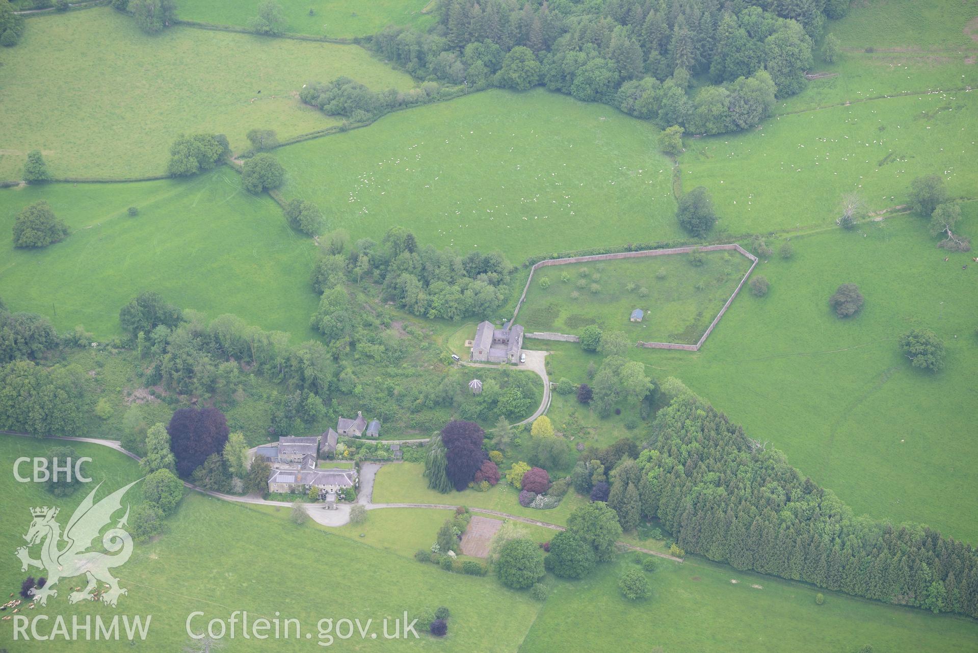 Llwyn-y-Brain house and garden, Llanwrda. Oblique aerial photograph taken during the Royal Commission's programme of archaeological aerial reconnaissance by Toby Driver on 11th June 2015.