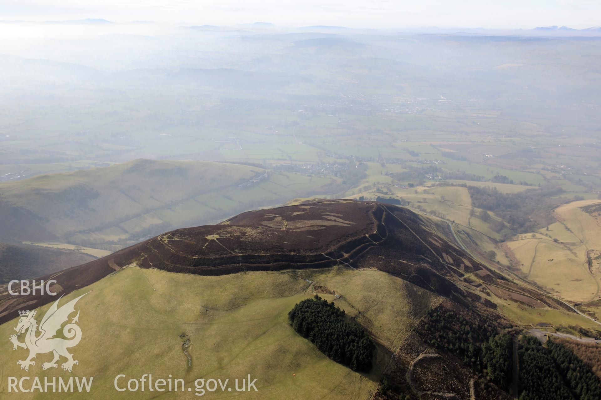 Foel Fenlli Hillfort, between Ruthin and Mold. Oblique aerial photograph taken during the Royal Commission?s programme of archaeological aerial reconnaissance by Toby Driver on 28th February 2013.