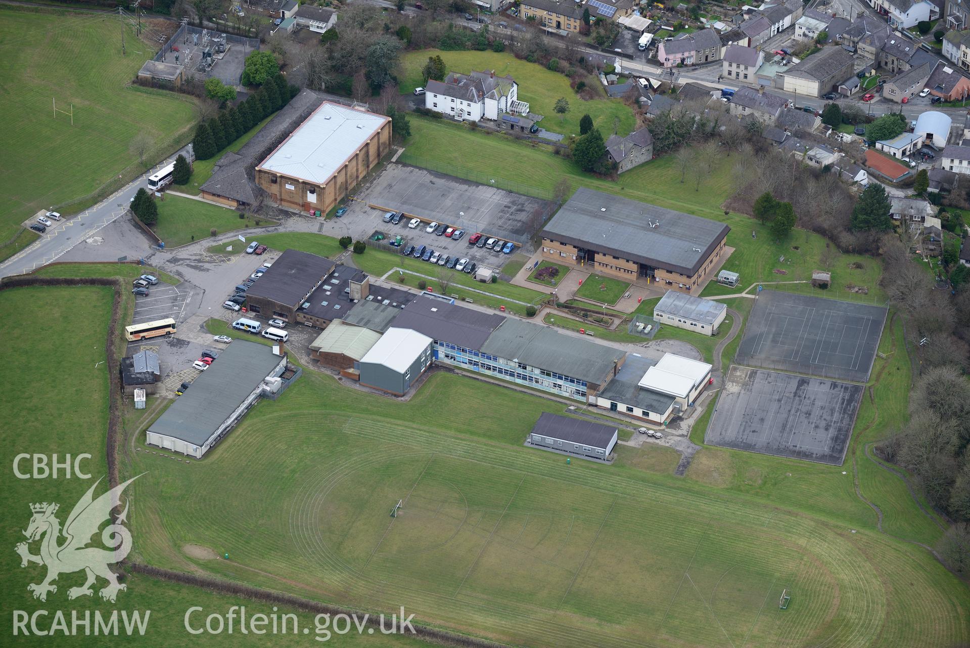 Ysgol Gyfun Emlyn high school, and the town leisure centre, Newcastle Emlyn. Oblique aerial photograph taken during the Royal Commission's programme of archaeological aerial reconnaissance by Toby Driver on 13th March 2015.