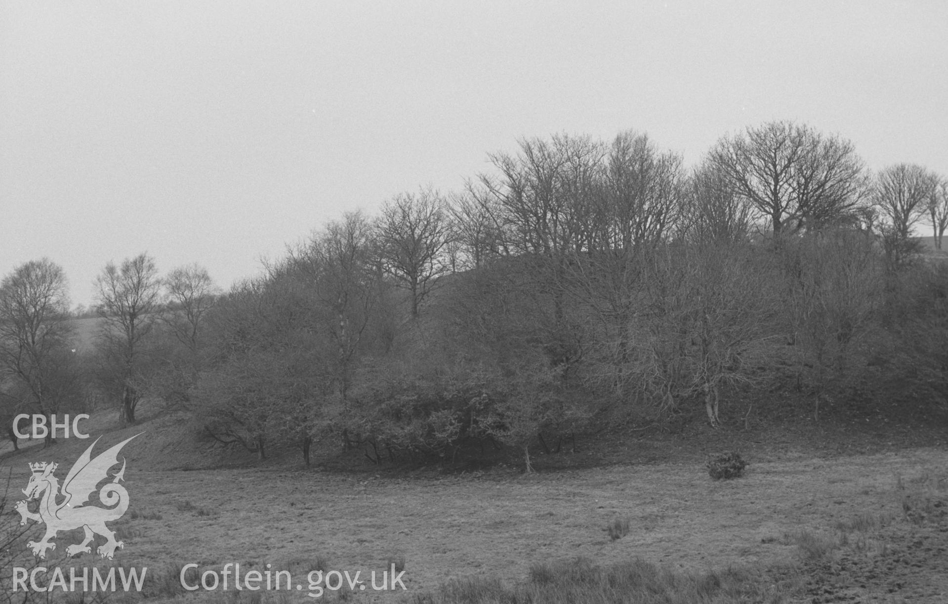 Digital copy of a black and white negative showing Cwm Castell, Mydriolyn, south east of New Quay. Photographed in April 1964 by Arthur O. Chater from Grid Reference SN 4692 5534, looking north-south east. Panorama, 3 of 3 photos.