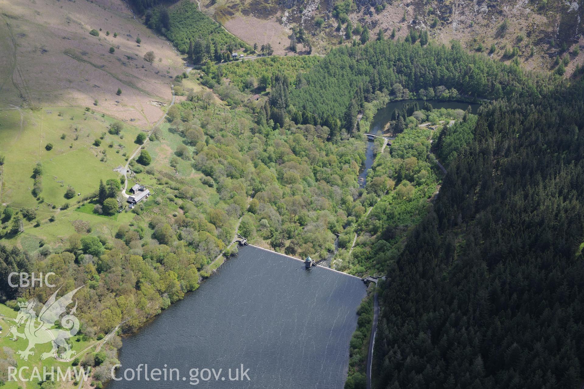 Pen-y-Garreg reservoir, dam and valve tower. Oblique aerial photograph taken during the Royal Commission's programme of archaeological aerial reconnaissance by Toby Driver on 3rd June 2015.