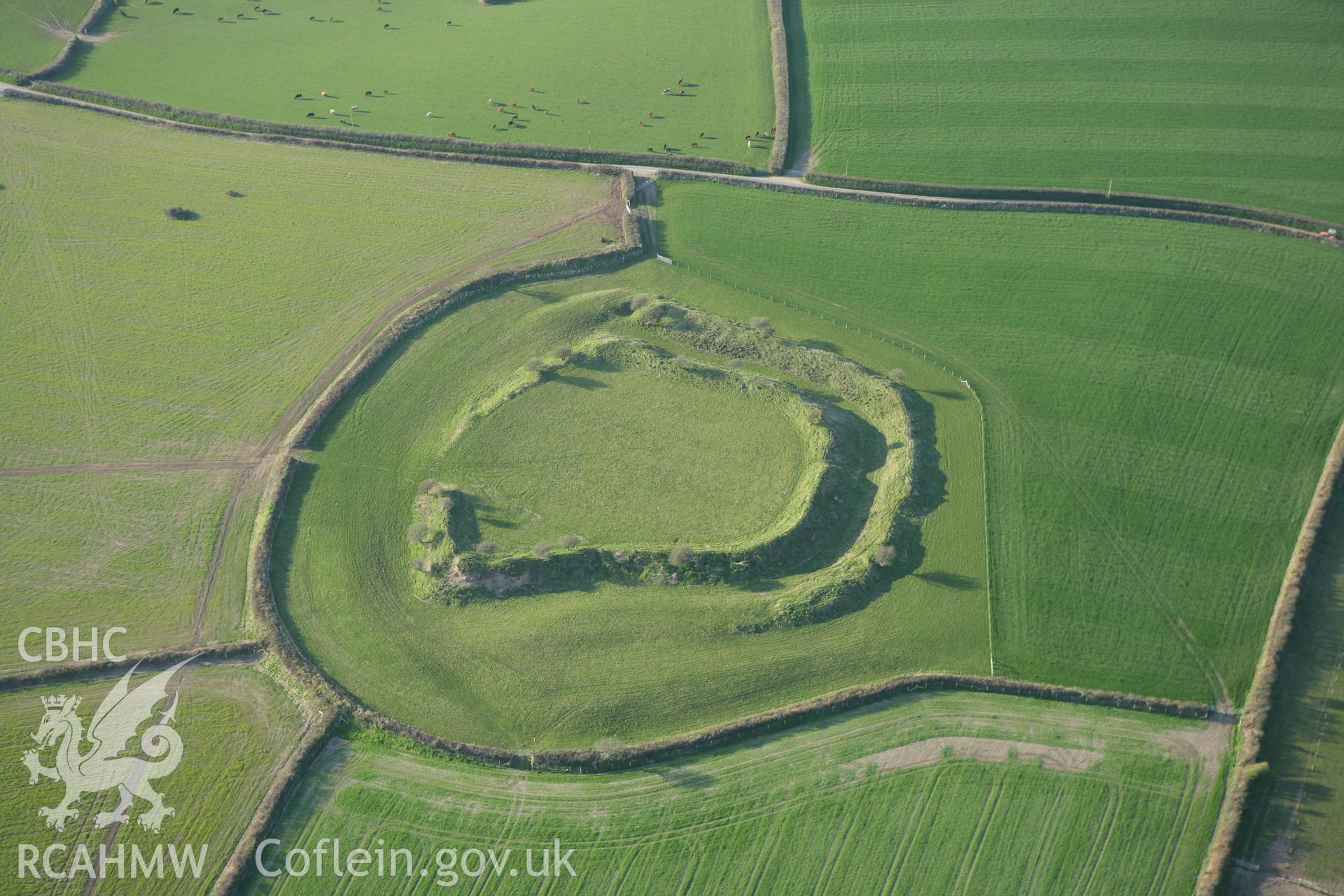 RCAHMW colour oblique aerial photograph of Romans Castle. Taken on 13 April 2010 by Toby Driver