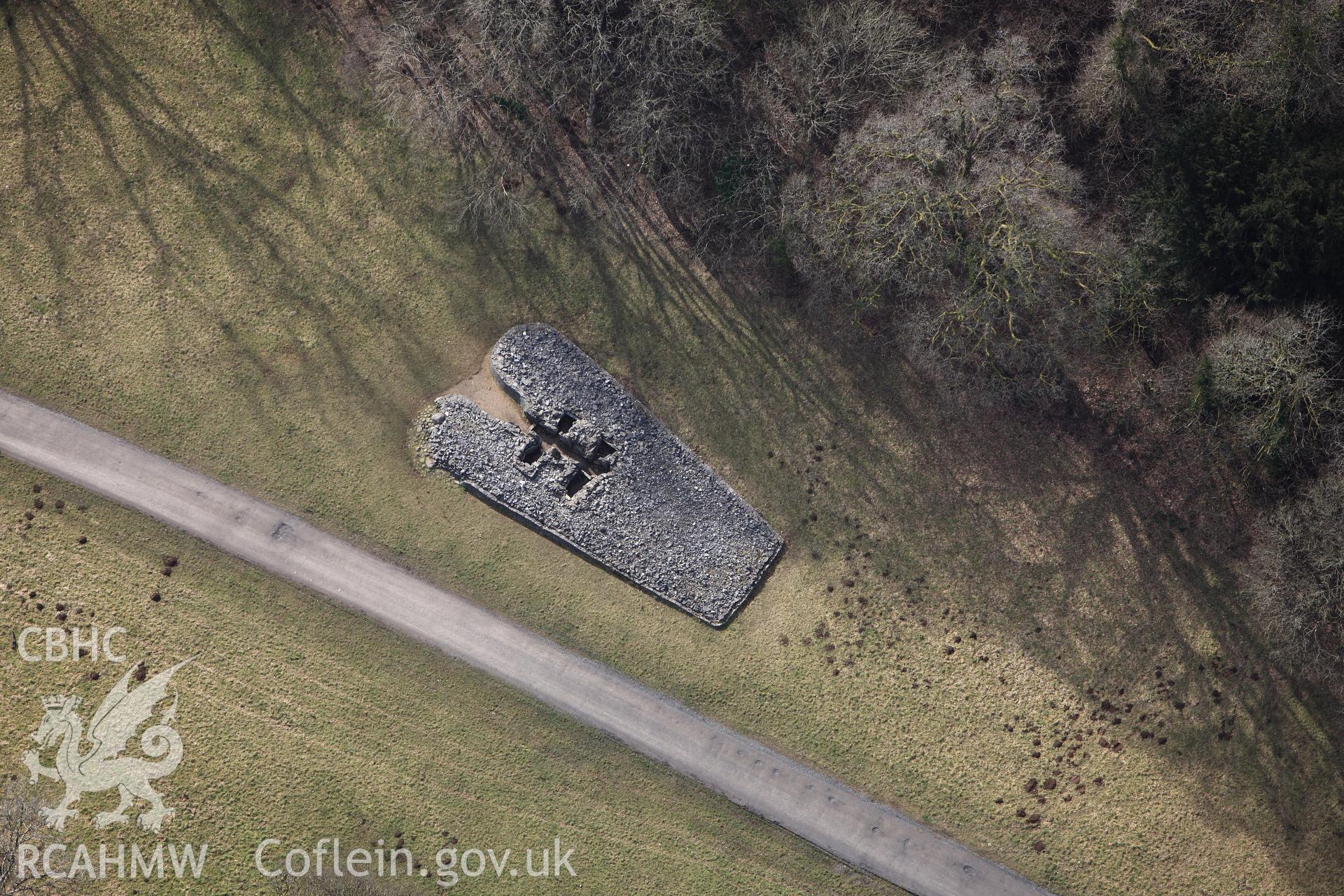 RCAHMW colour oblique photograph of Parc le Breos Burial Chamber;Parc Cwm Long Cairn. Taken by Toby Driver on 02/03/2010.