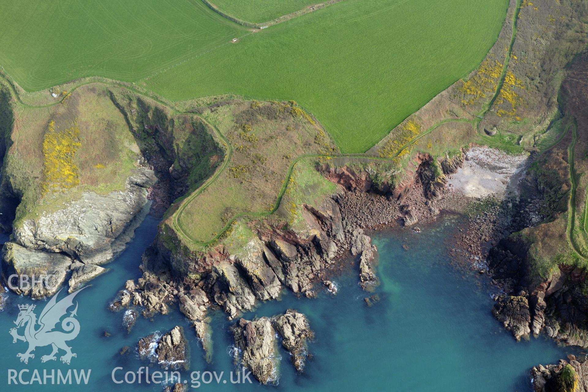 Aerial photography of Castle Head promontory fort taken on 27th March 2017. Baseline aerial reconnaissance survey for the CHERISH Project. ? Crown: CHERISH PROJECT 2017. Produced with EU funds through the Ireland Wales Co-operation Programme 2014-2020. All material made freely available through the Open Government Licence.