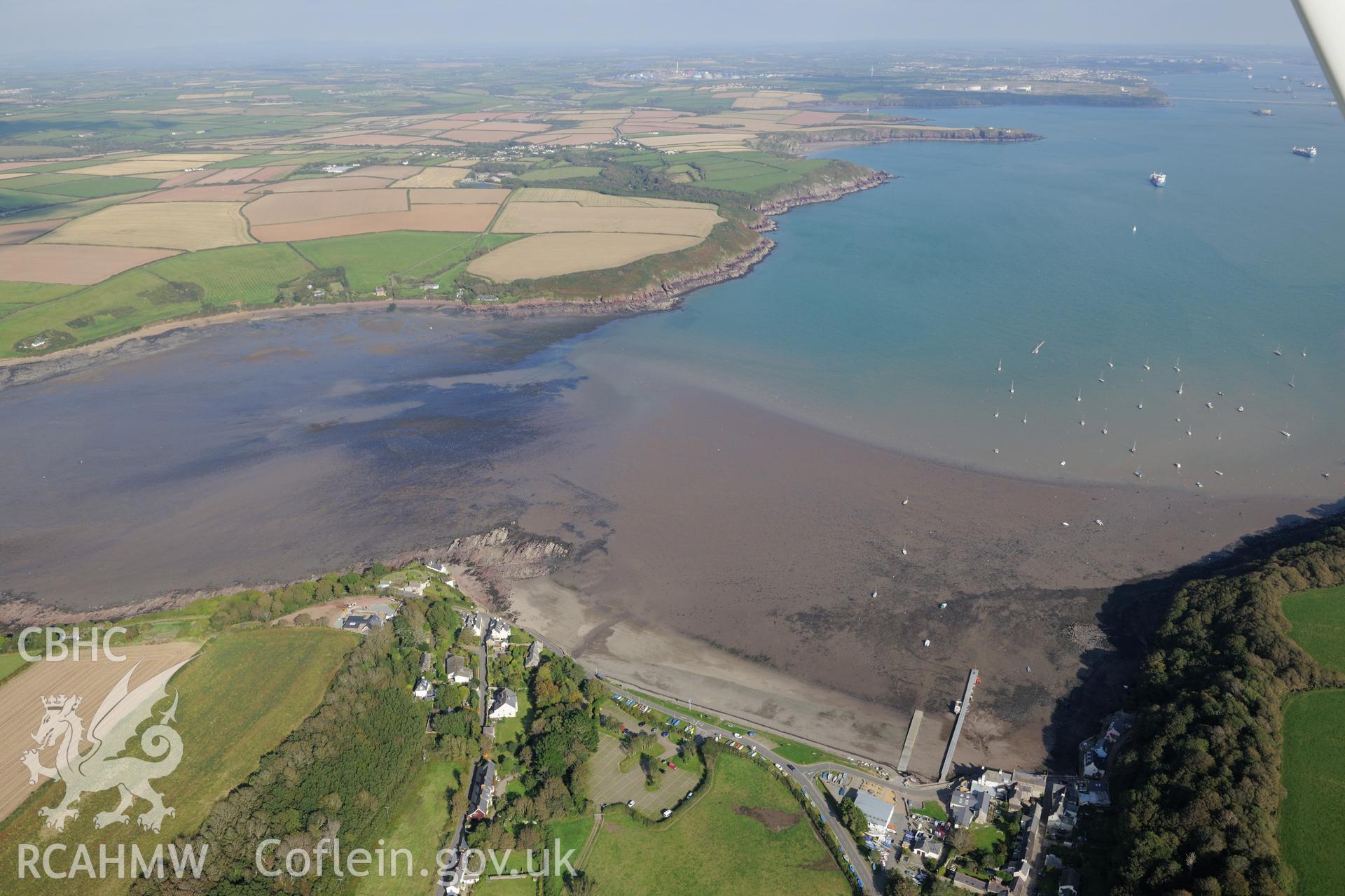 The village of Dale and its landing place on the Pembrokeshire coast, west of Milford Haven. Oblique aerial photograph taken during Royal Commission's programme of archaeological aerial reconnaissance by Toby Driver on 30th September 2015.